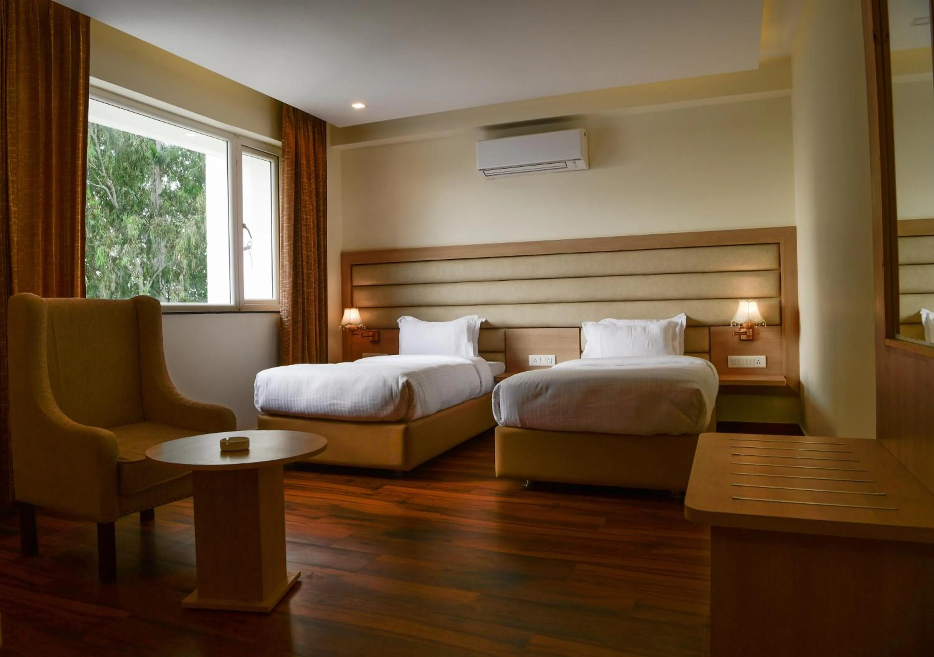 Bed in Hotel White Rock By The Solitaire Hospitality