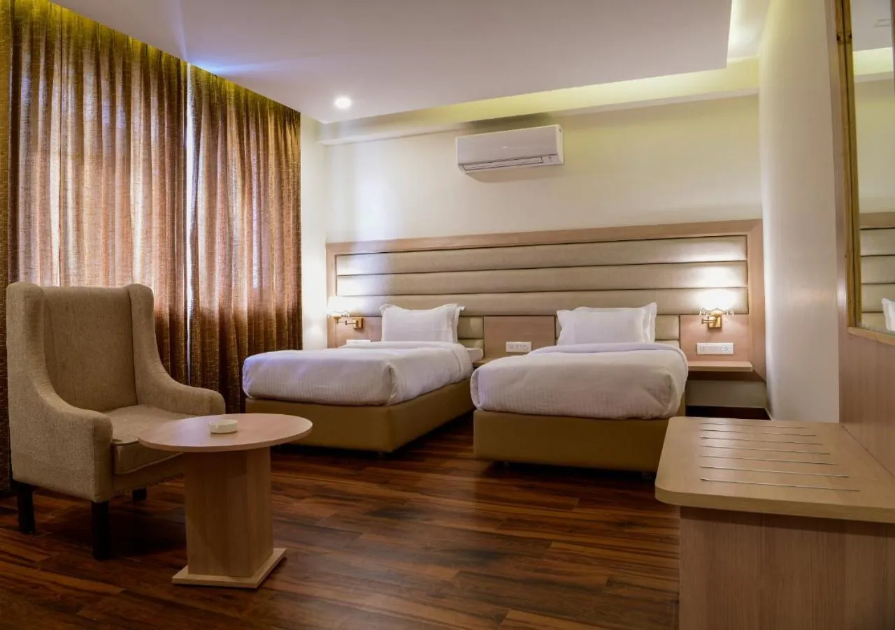 Photo of the whole room, Bed in Hotel White Rock By The Solitaire Hospitality