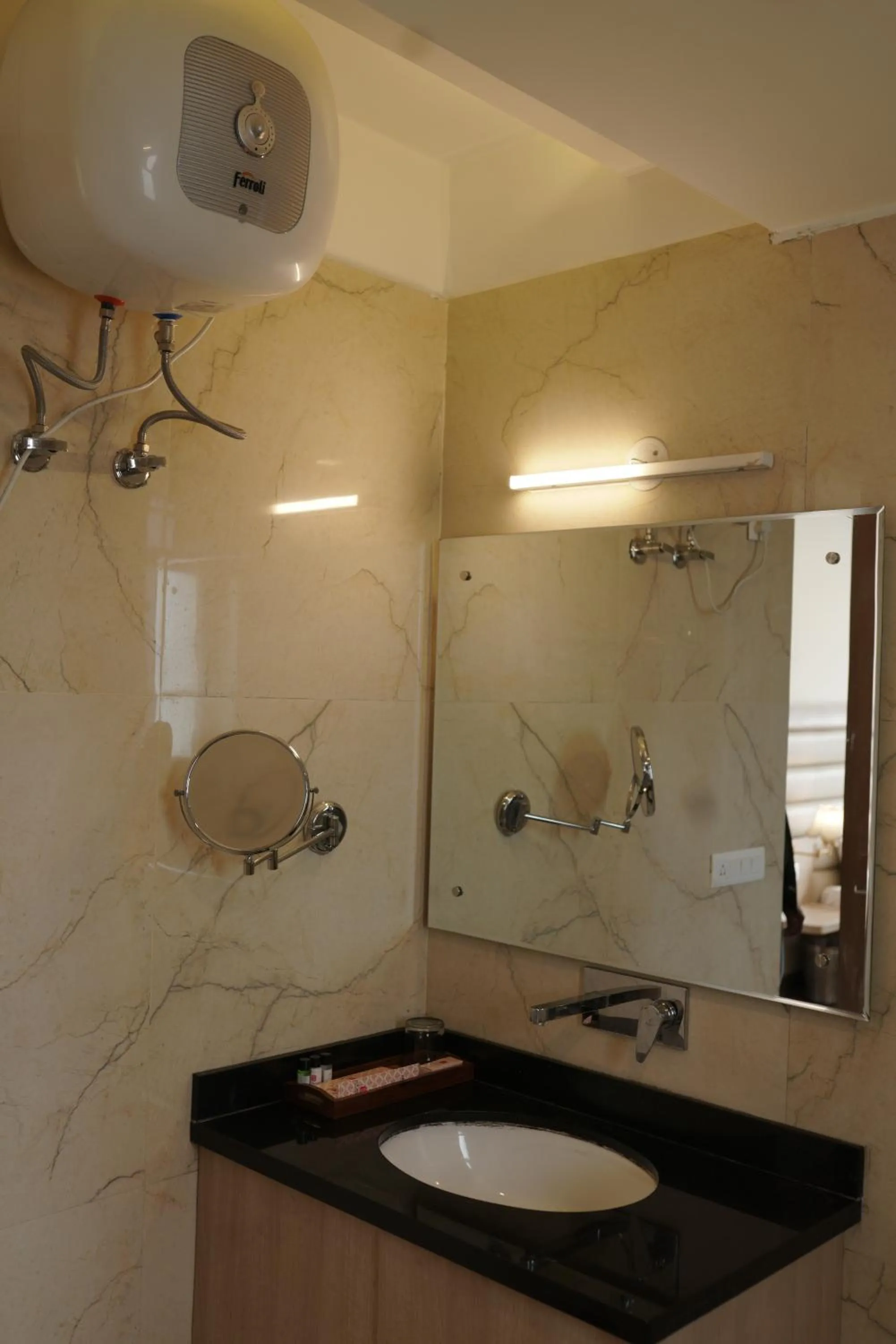 Bathroom in Hotel White Rock By The Solitaire Hospitality