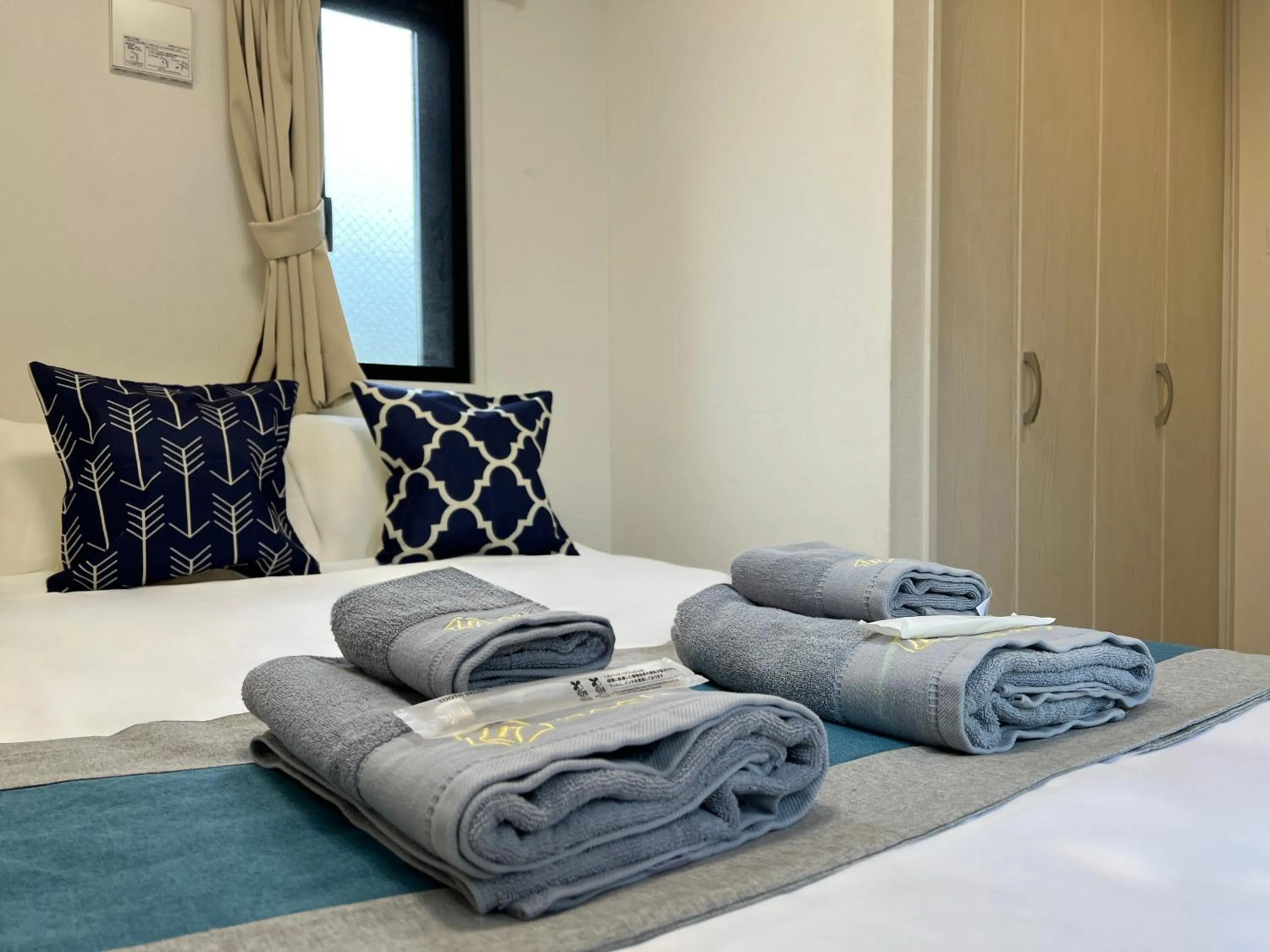 Bed in nestay inn tokyo kagurazaka