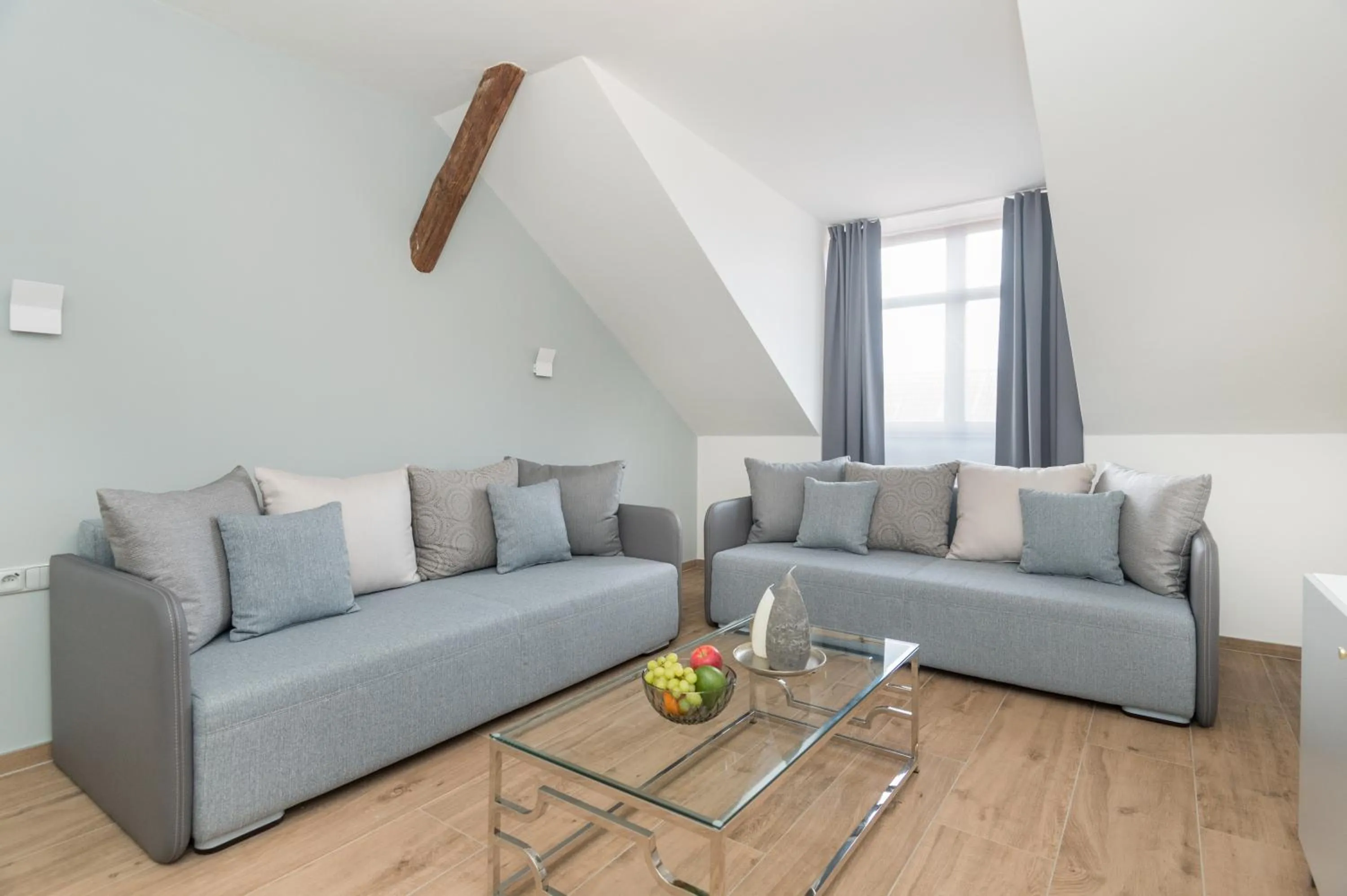 Living room in Eight Secrets Boutique Residence by Dwellfort