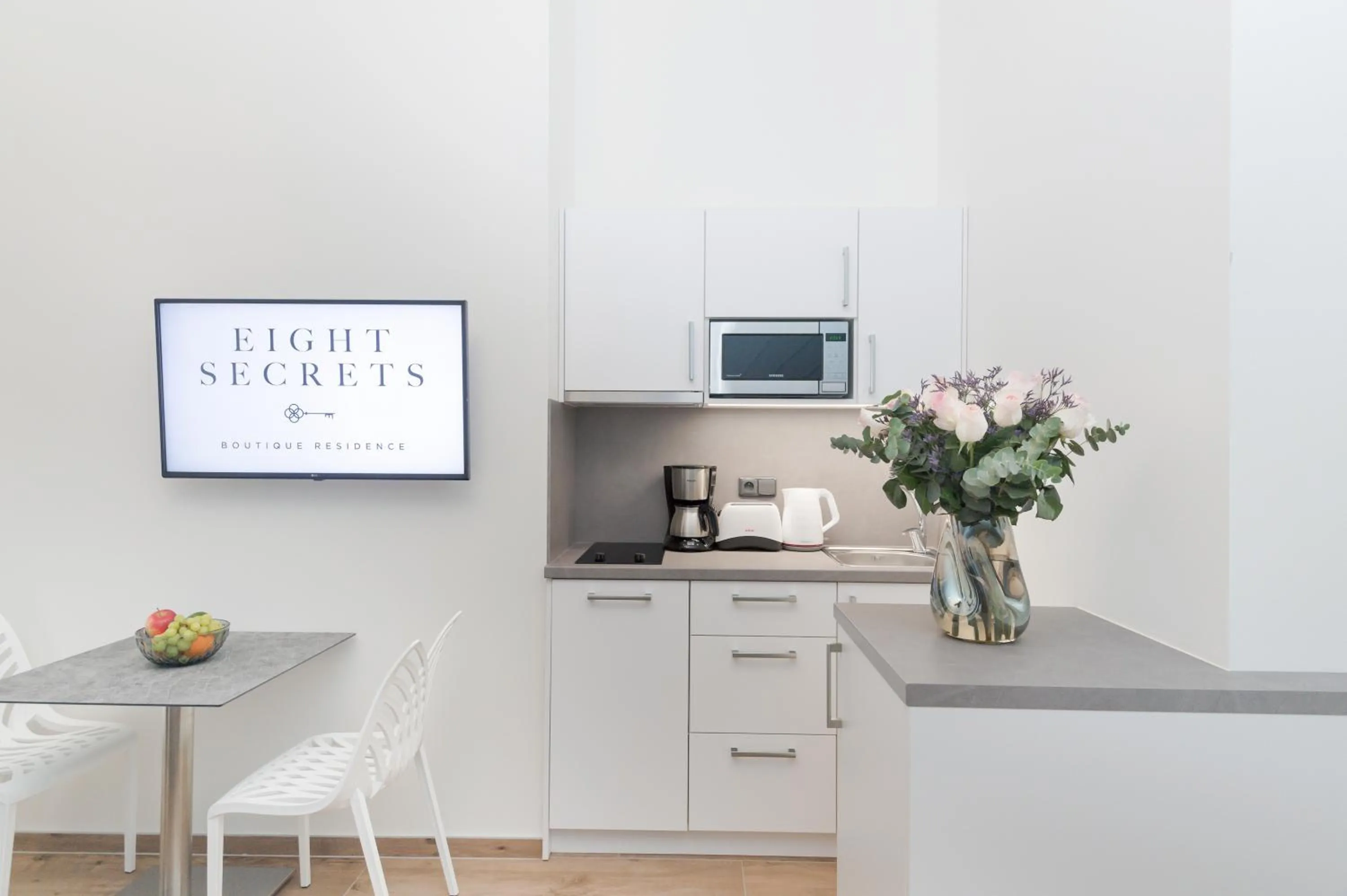 Kitchen or kitchenette in Eight Secrets Boutique Residence by Dwellfort