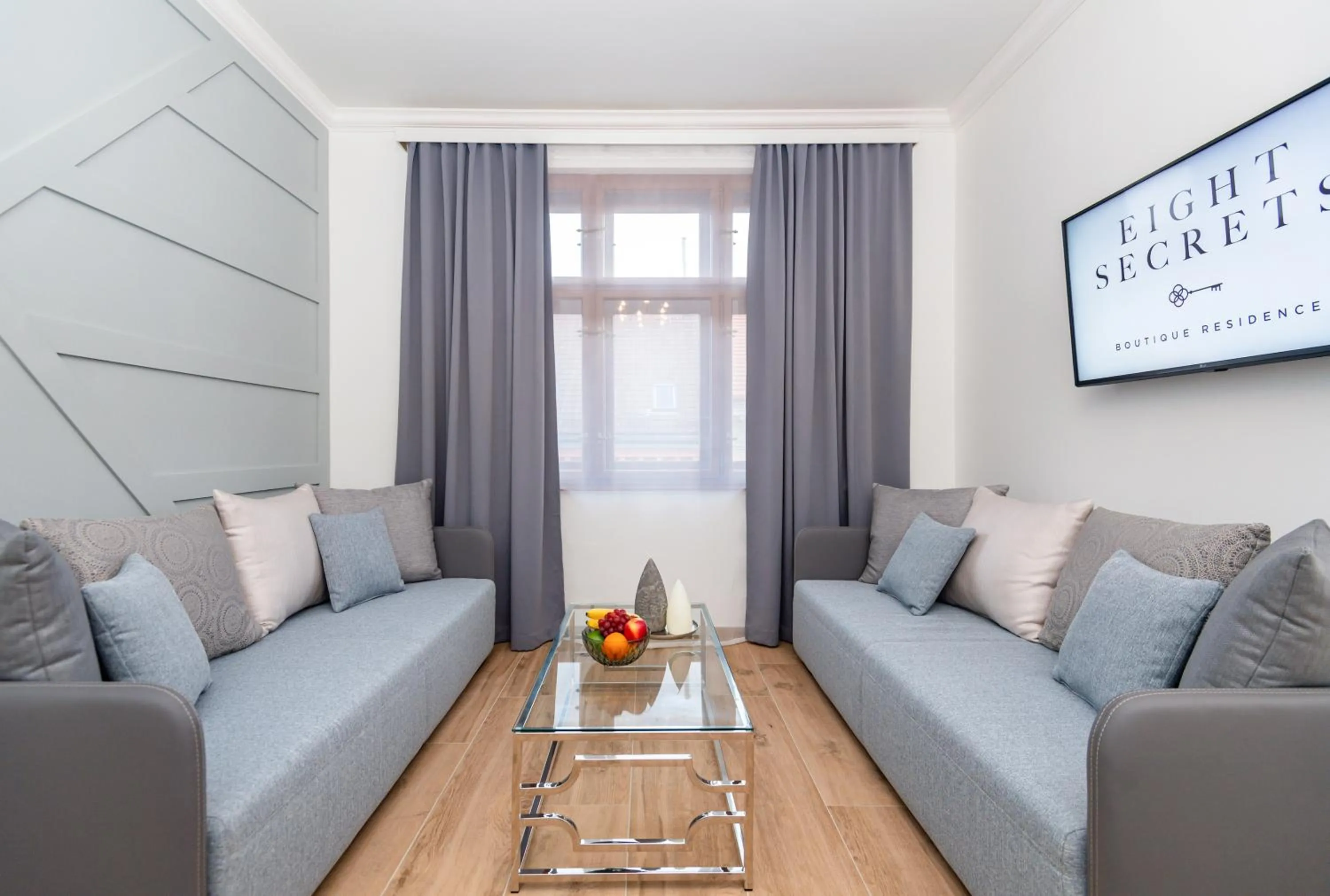 Living room in Eight Secrets Boutique Residence by Dwellfort