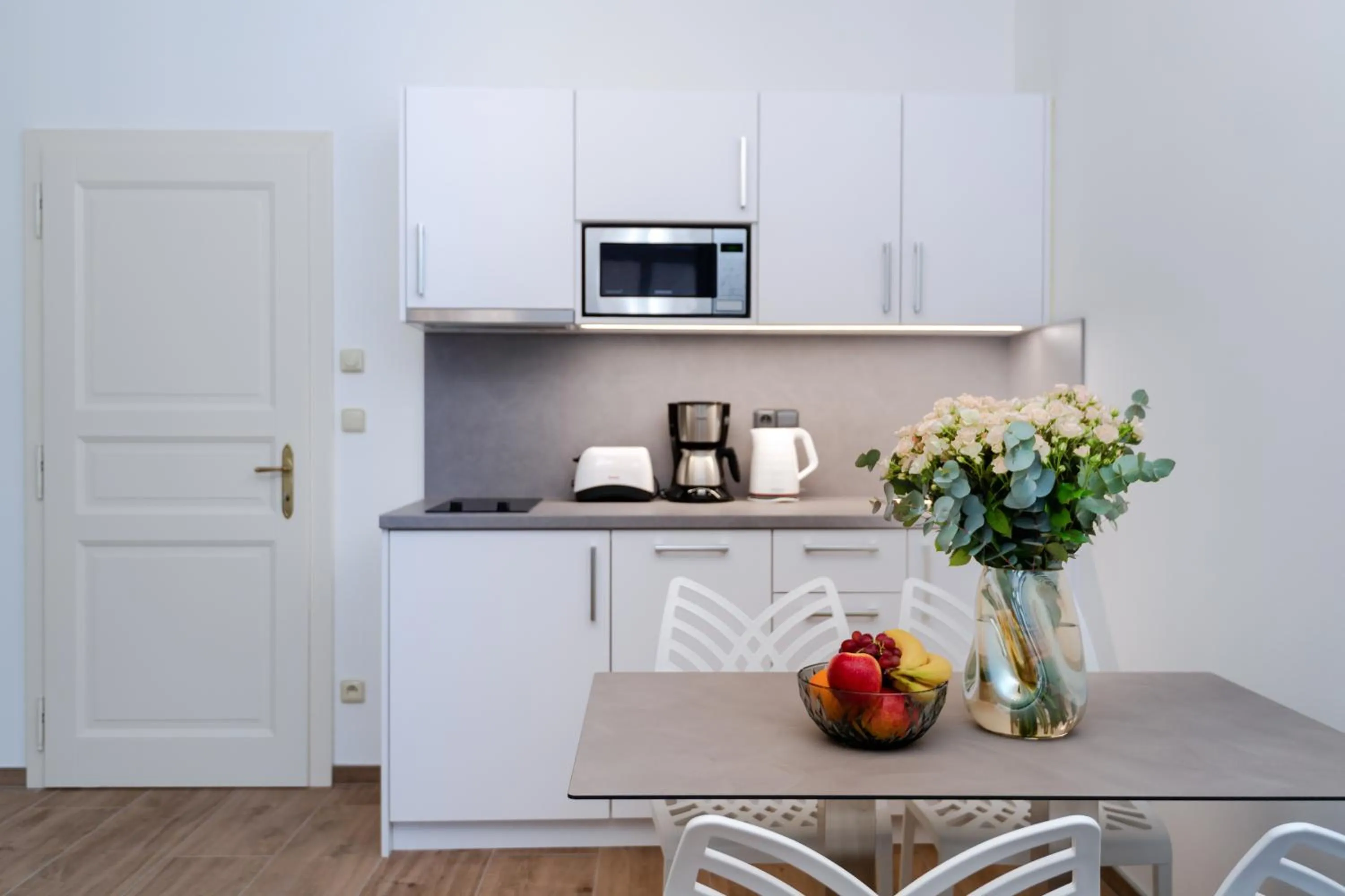 Kitchen or kitchenette in Eight Secrets Boutique Residence by Dwellfort