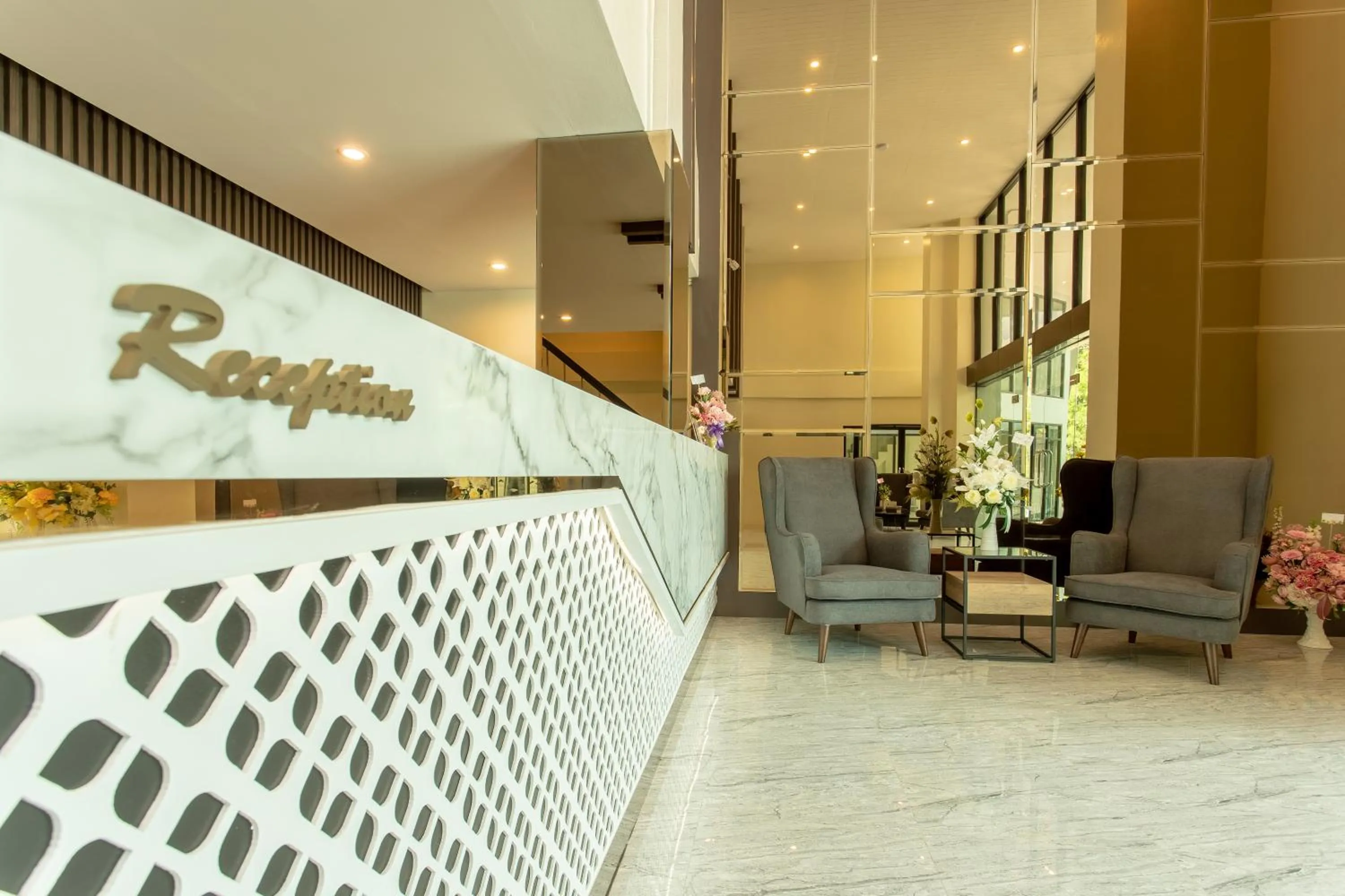 Lobby or reception in SJ Miracle Hotel