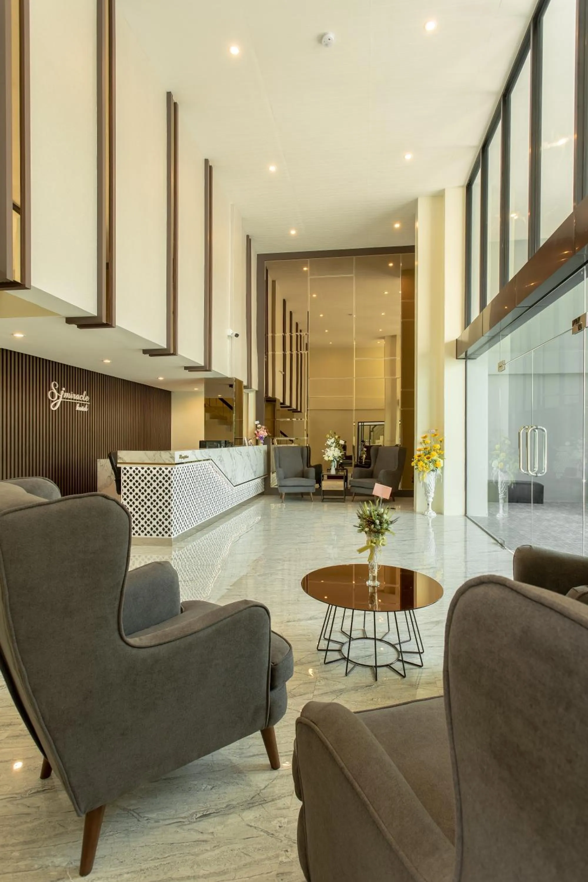 Lobby or reception in SJ Miracle Hotel