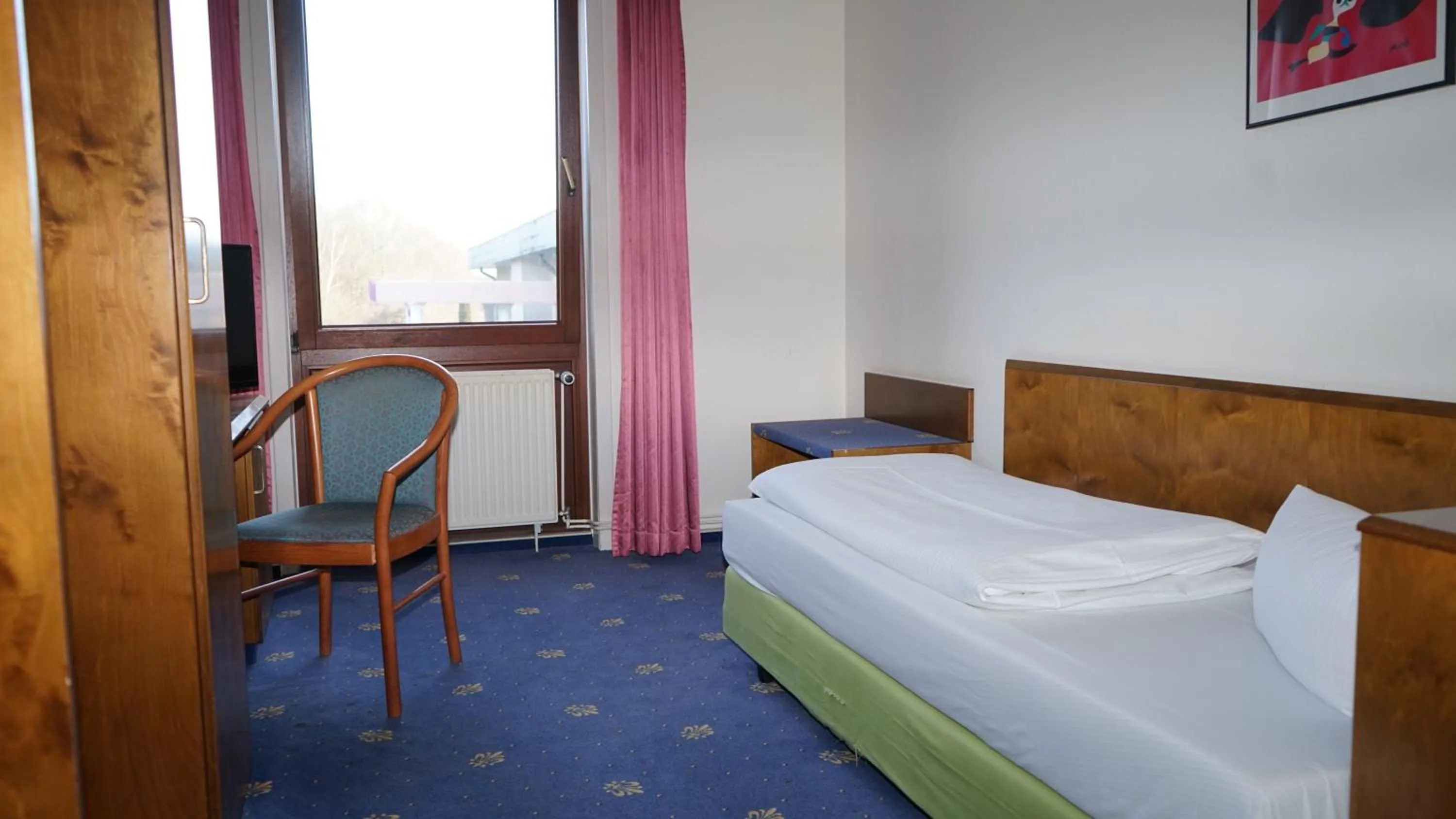 Bed in ITM Entrée Glinde Restaurant & Tagungshotel