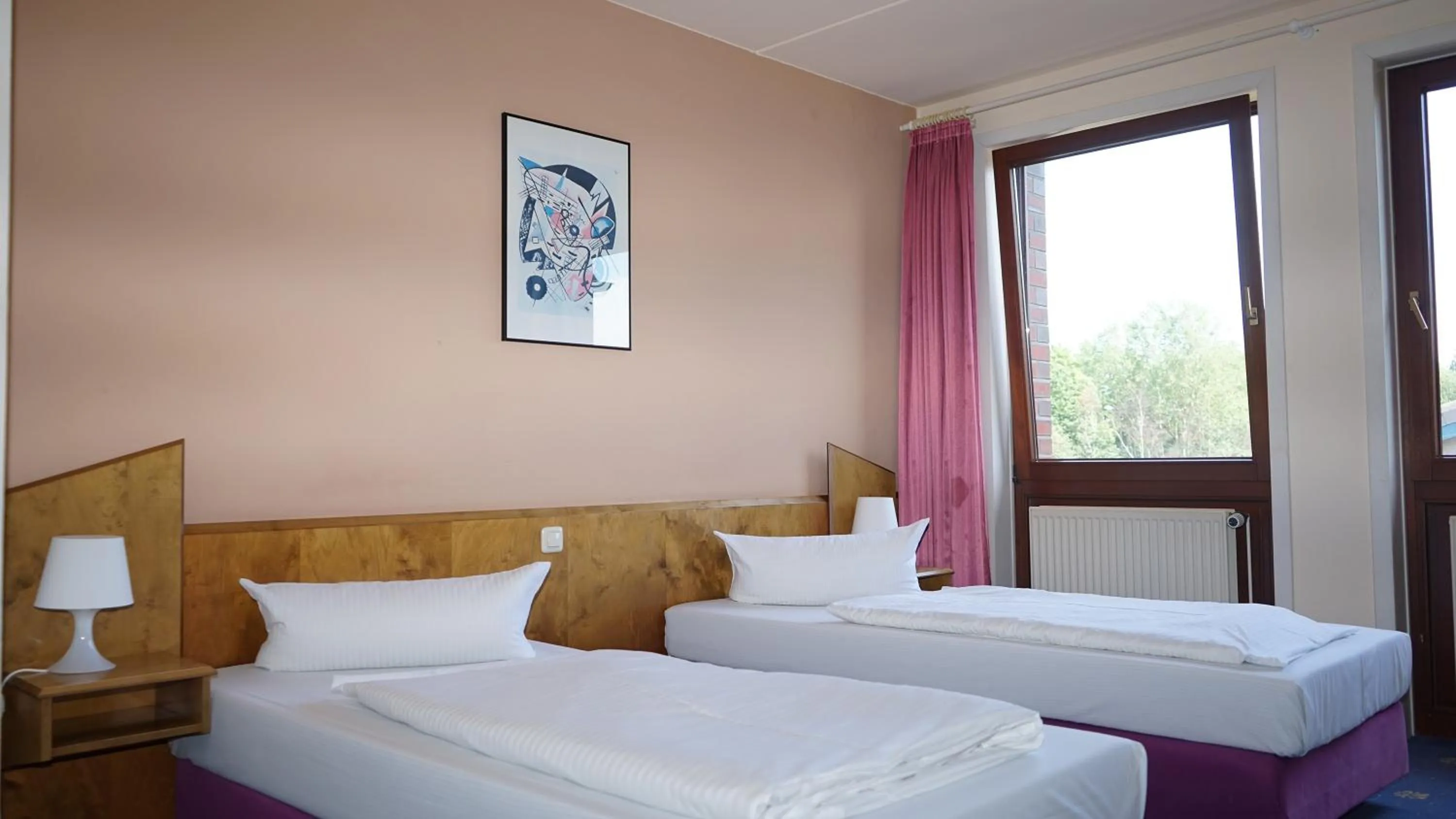 Bed in ITM Entrée Glinde Restaurant & Tagungshotel