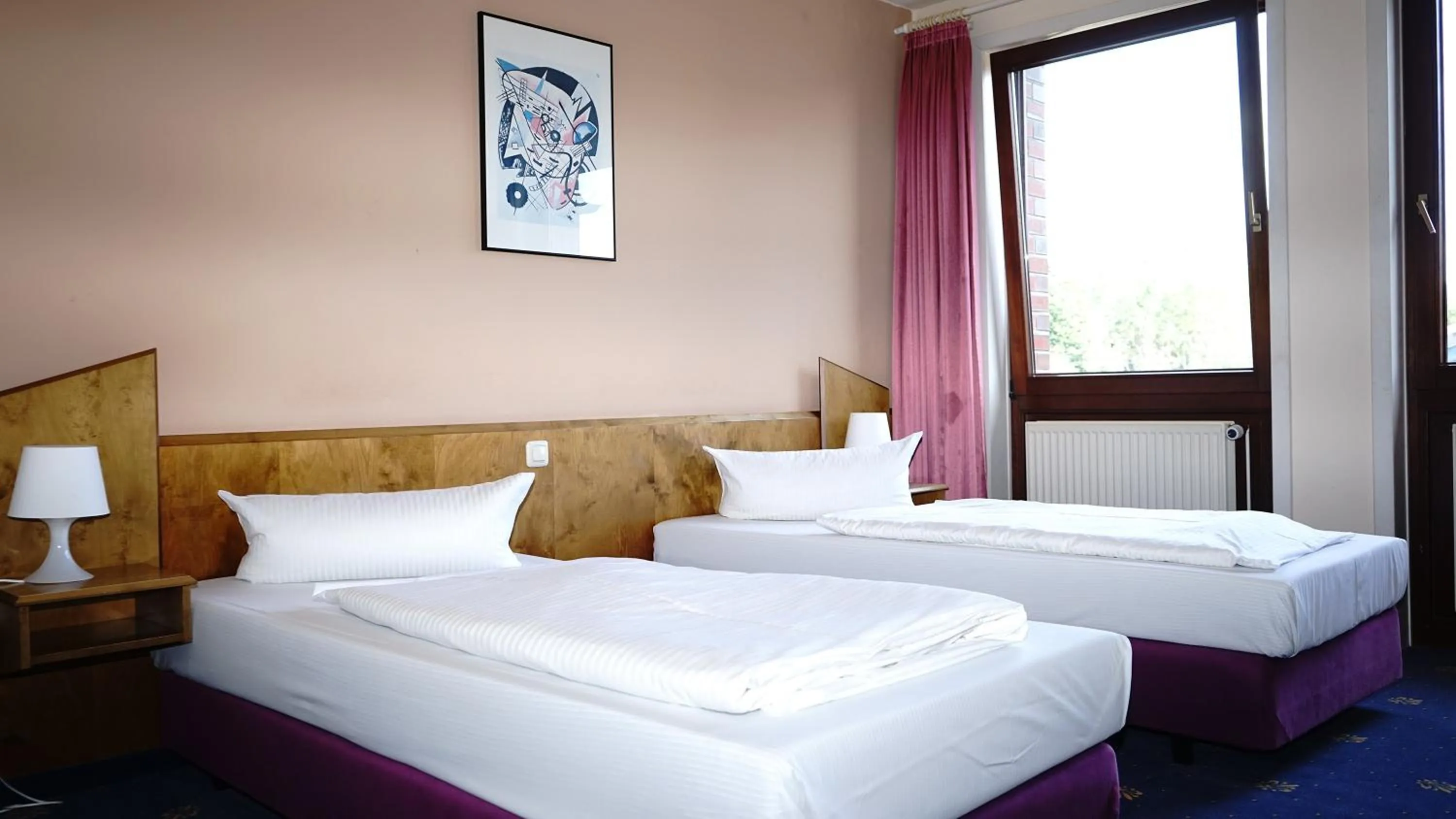 Bed in ITM Entrée Glinde Restaurant & Tagungshotel