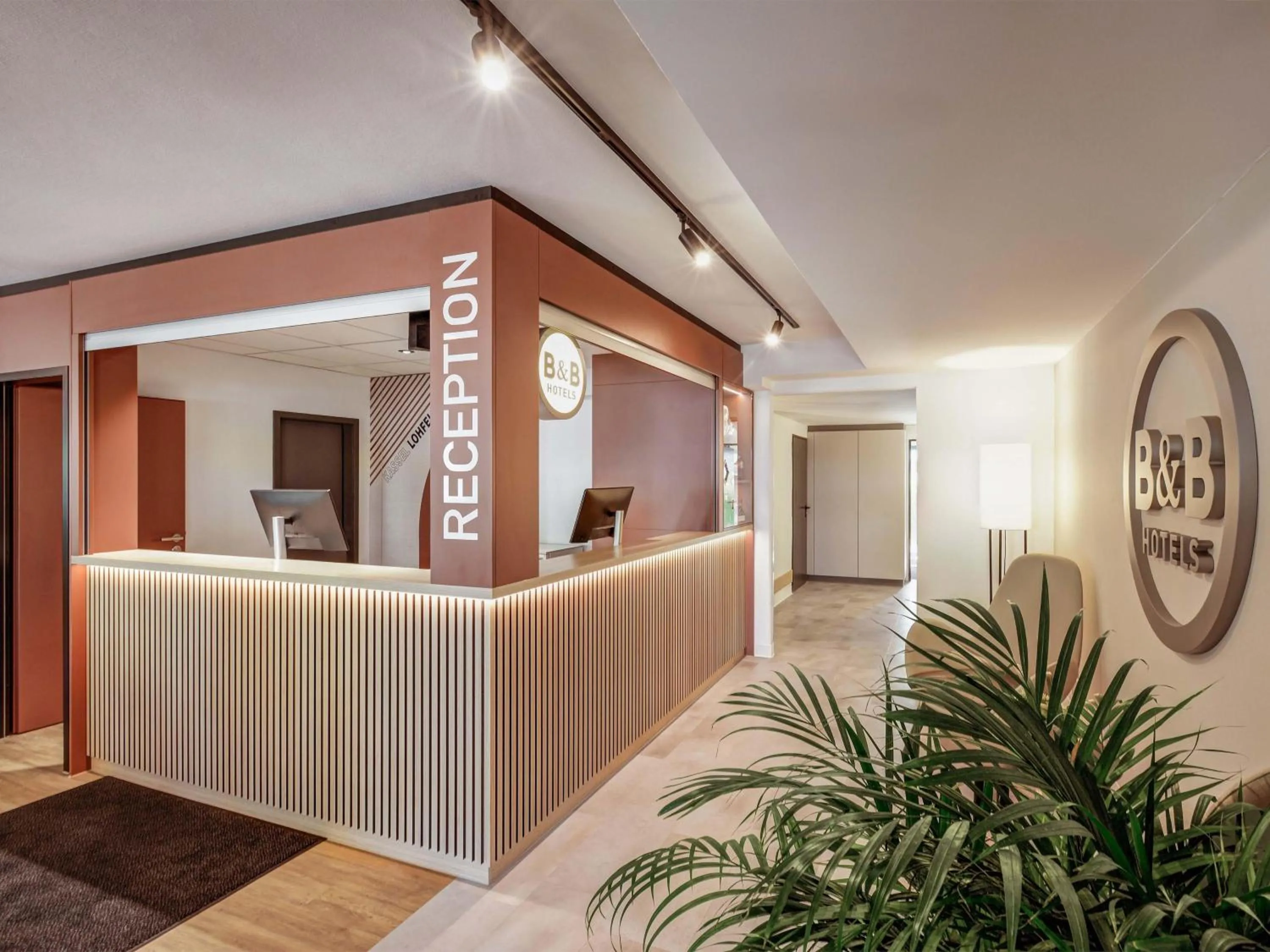 Lobby or reception in B&B HOTEL Kassel-Lohfelden