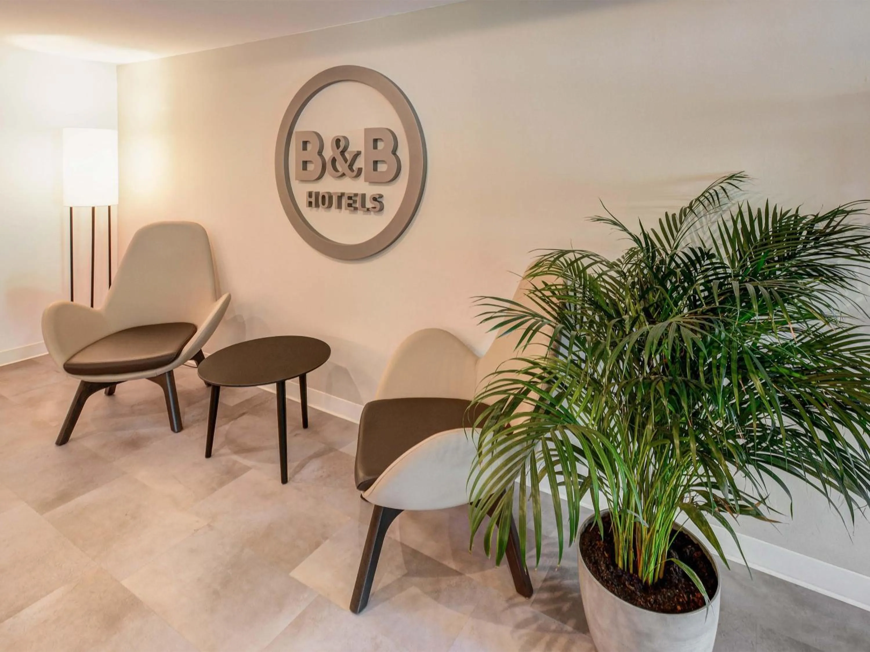 Lobby or reception in B&B HOTEL Kassel-Lohfelden