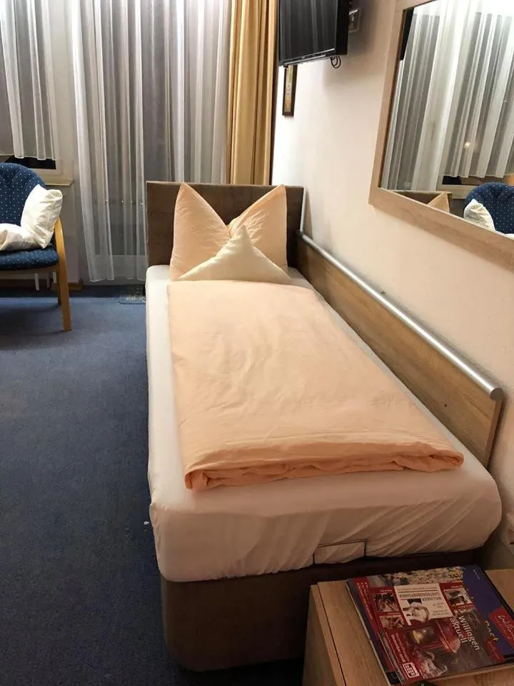 Photo of the whole room, Bed in Sevda's Hotel Garni Weinforth