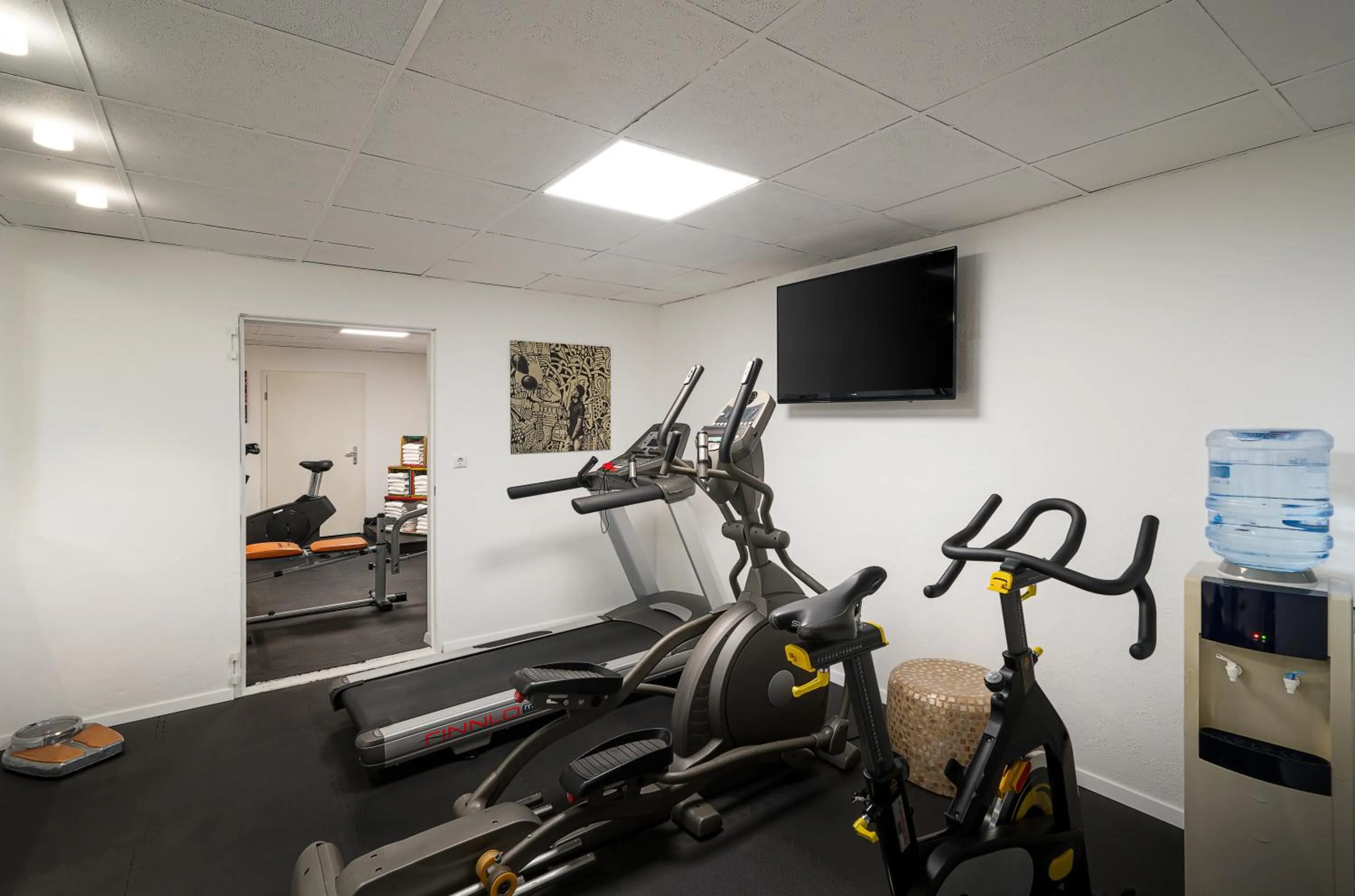 Fitness centre/facilities in QU Hotel Augsburg