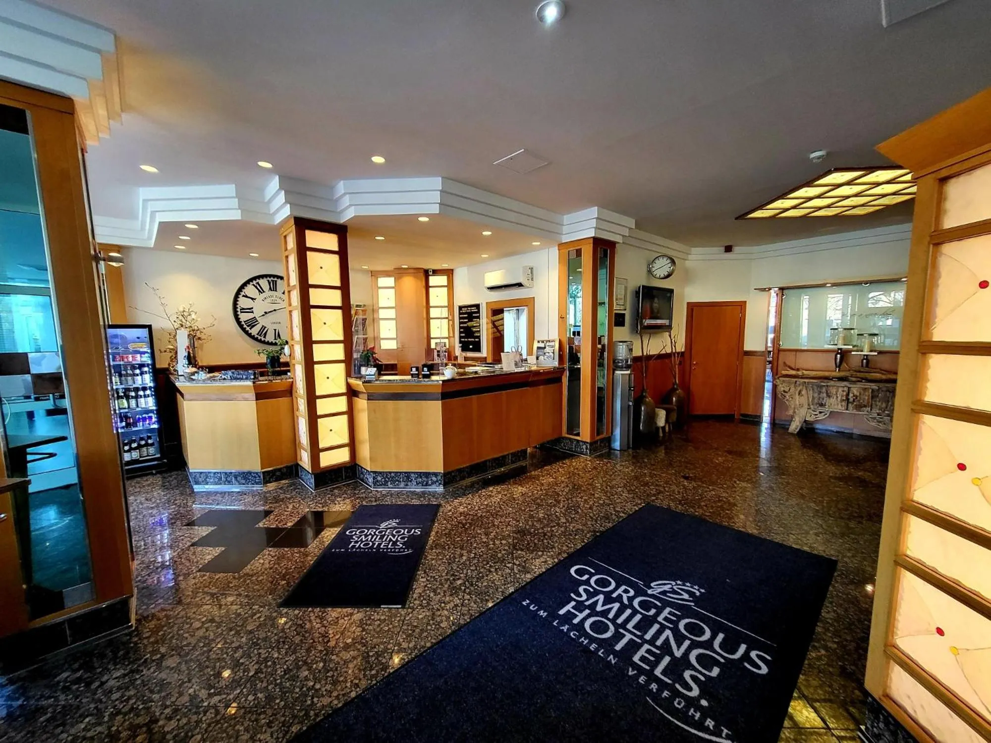 Lobby or reception in QU Hotel Augsburg