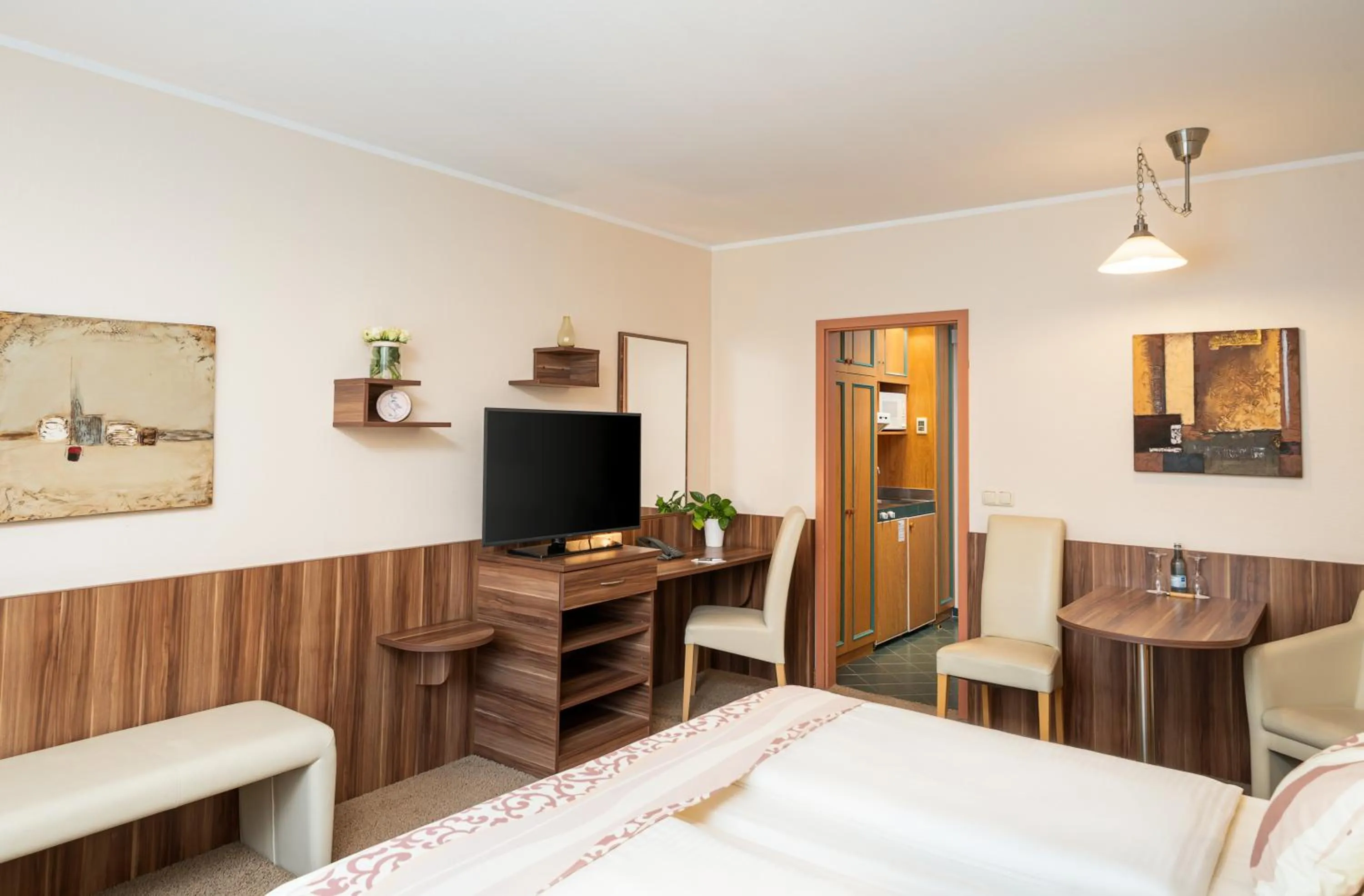 Photo of the whole room, Bed in QU Hotel Augsburg