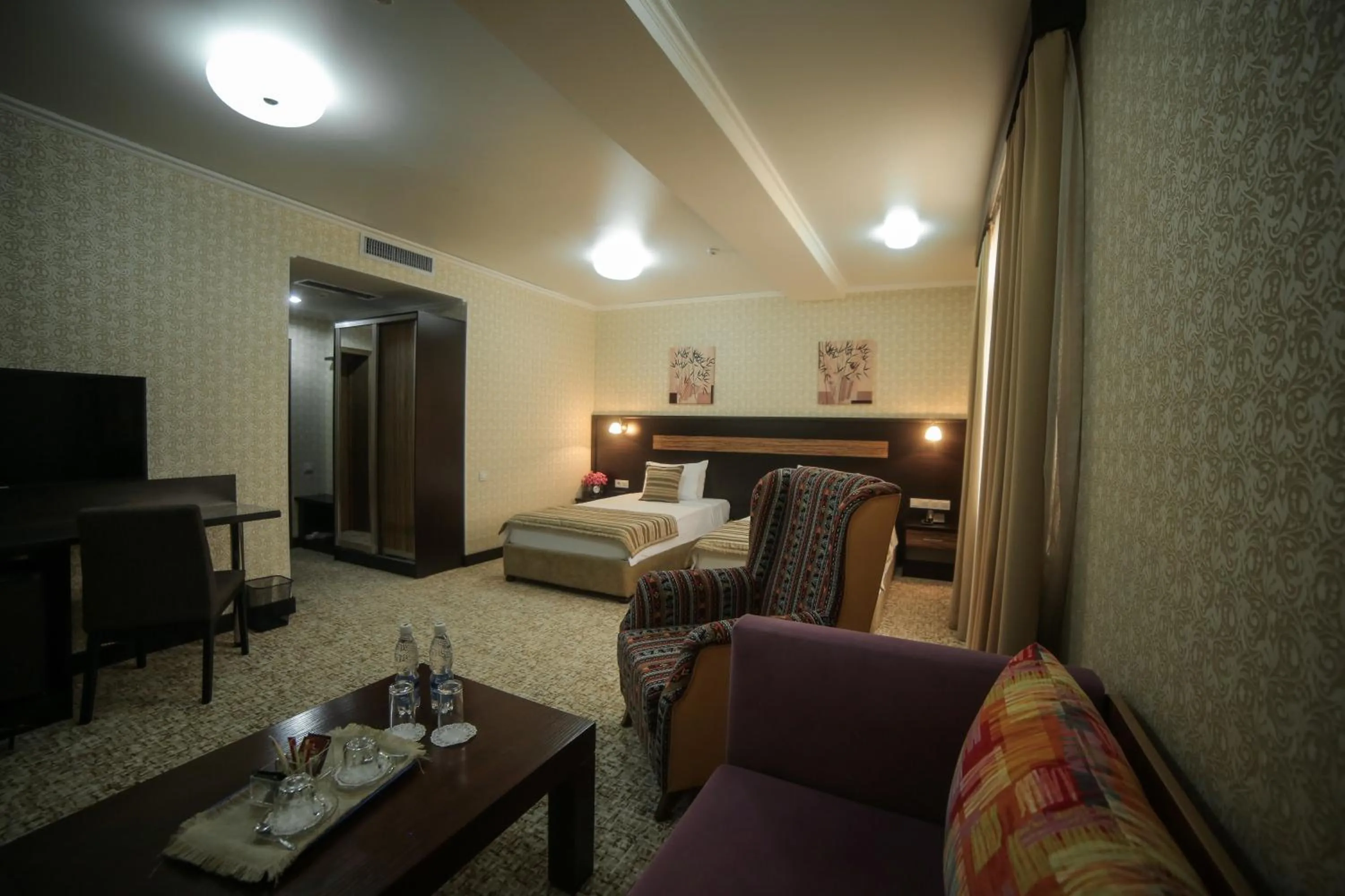 Living room, Bed in Onyx Hotel Bishkek