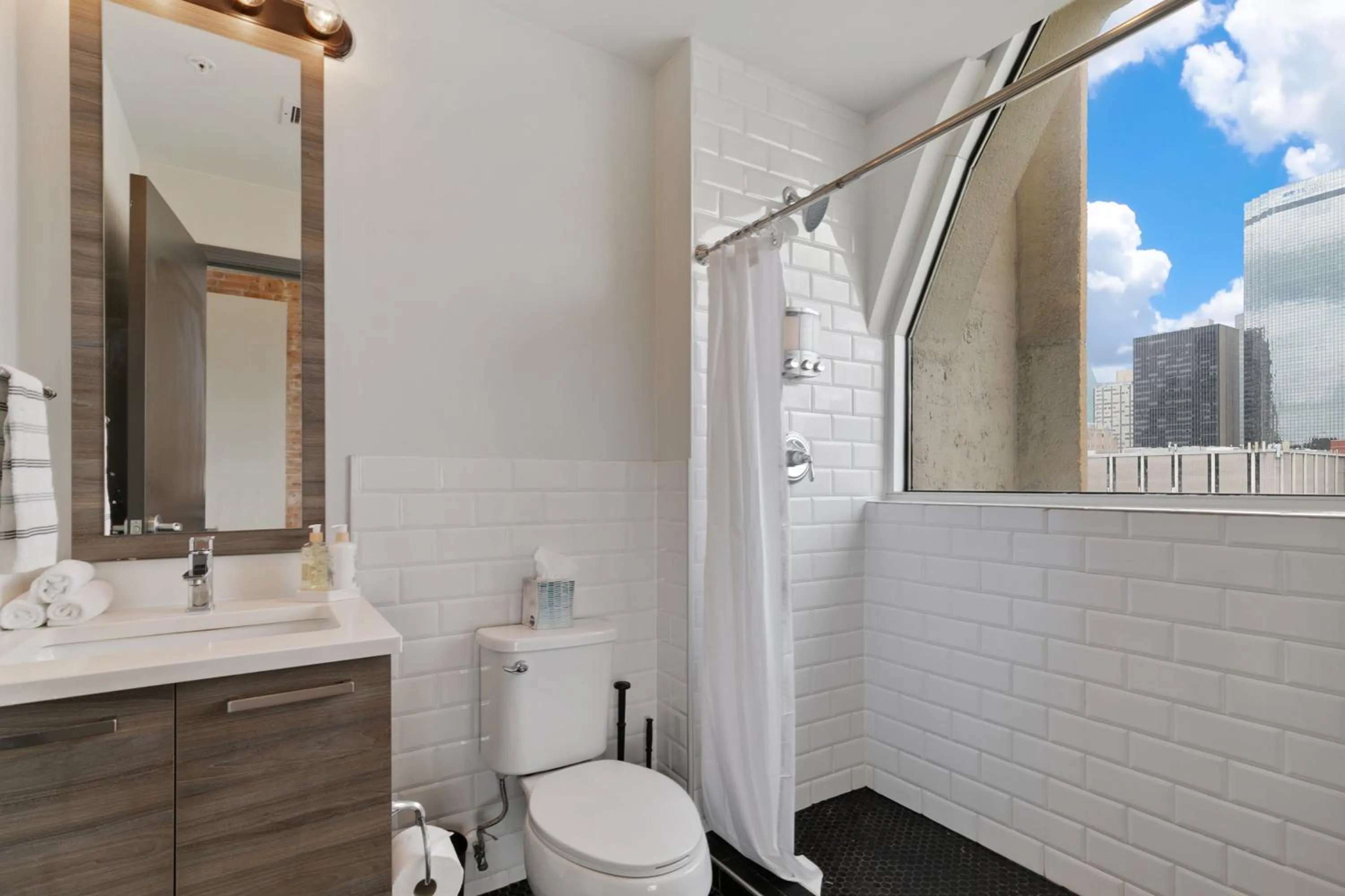 Shower in Luxury Downtown Dallas Stay by Amyfinehouse