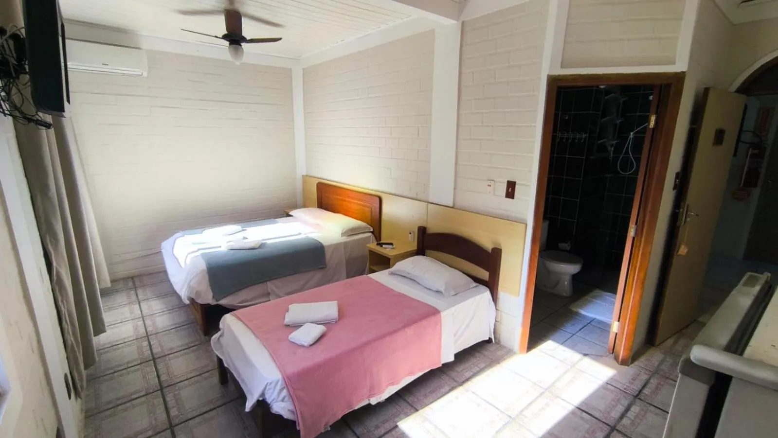 Bed in Pousada Maré de Lua