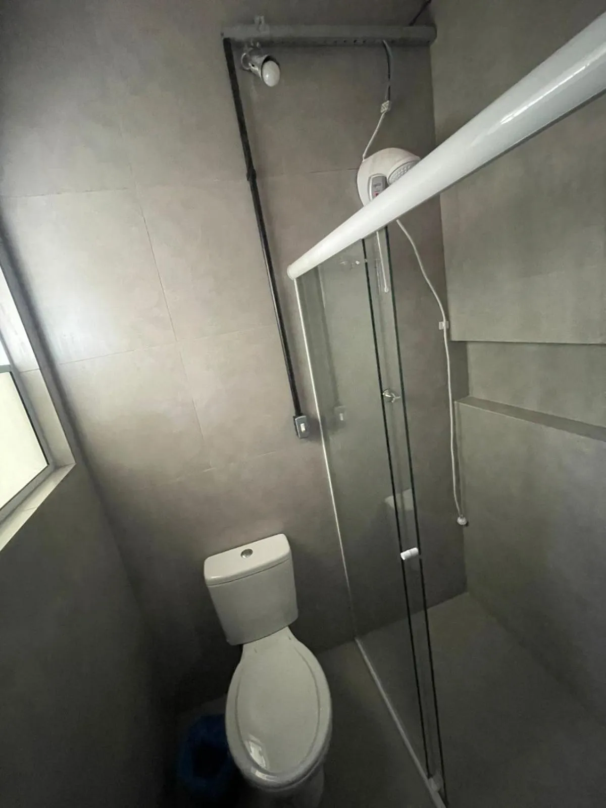 Bathroom in Esquina 8 Suítes Confort & Hostel