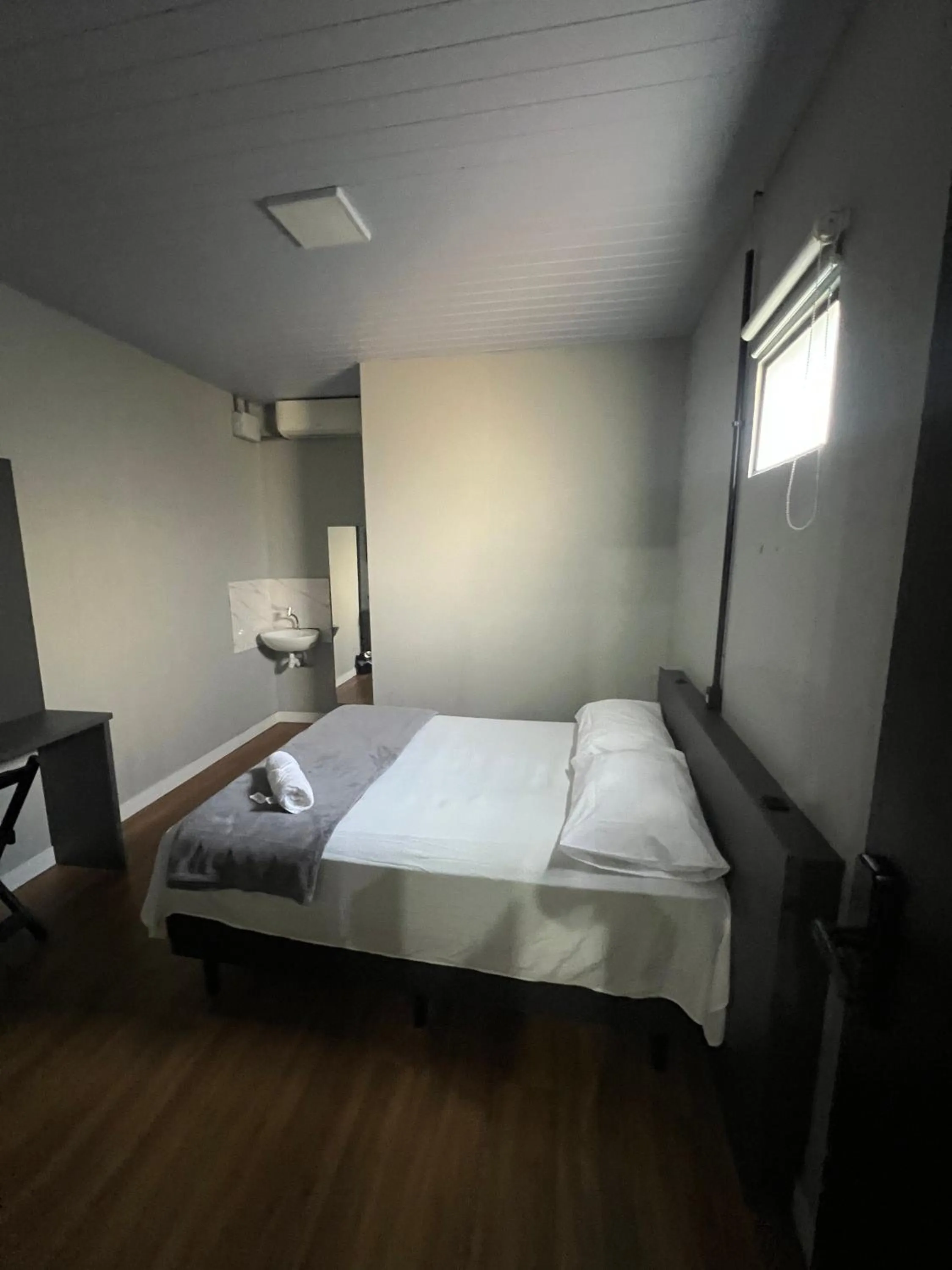 Photo of the whole room, Bed in Esquina 8 Suítes Confort & Hostel