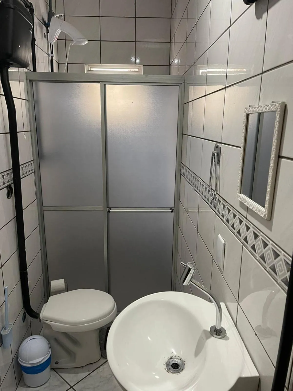 Bathroom in Esquina 8 Suítes Confort & Hostel