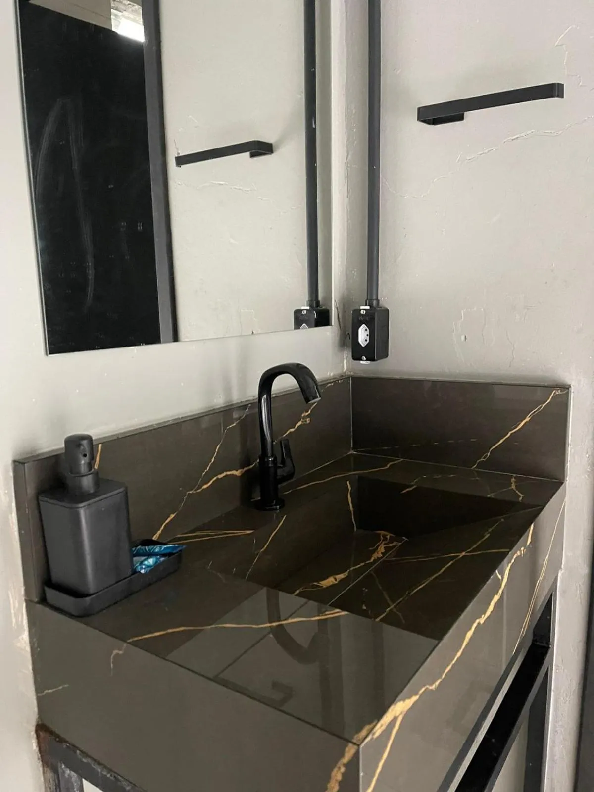 Bathroom in Esquina 8 Suítes Confort & Hostel