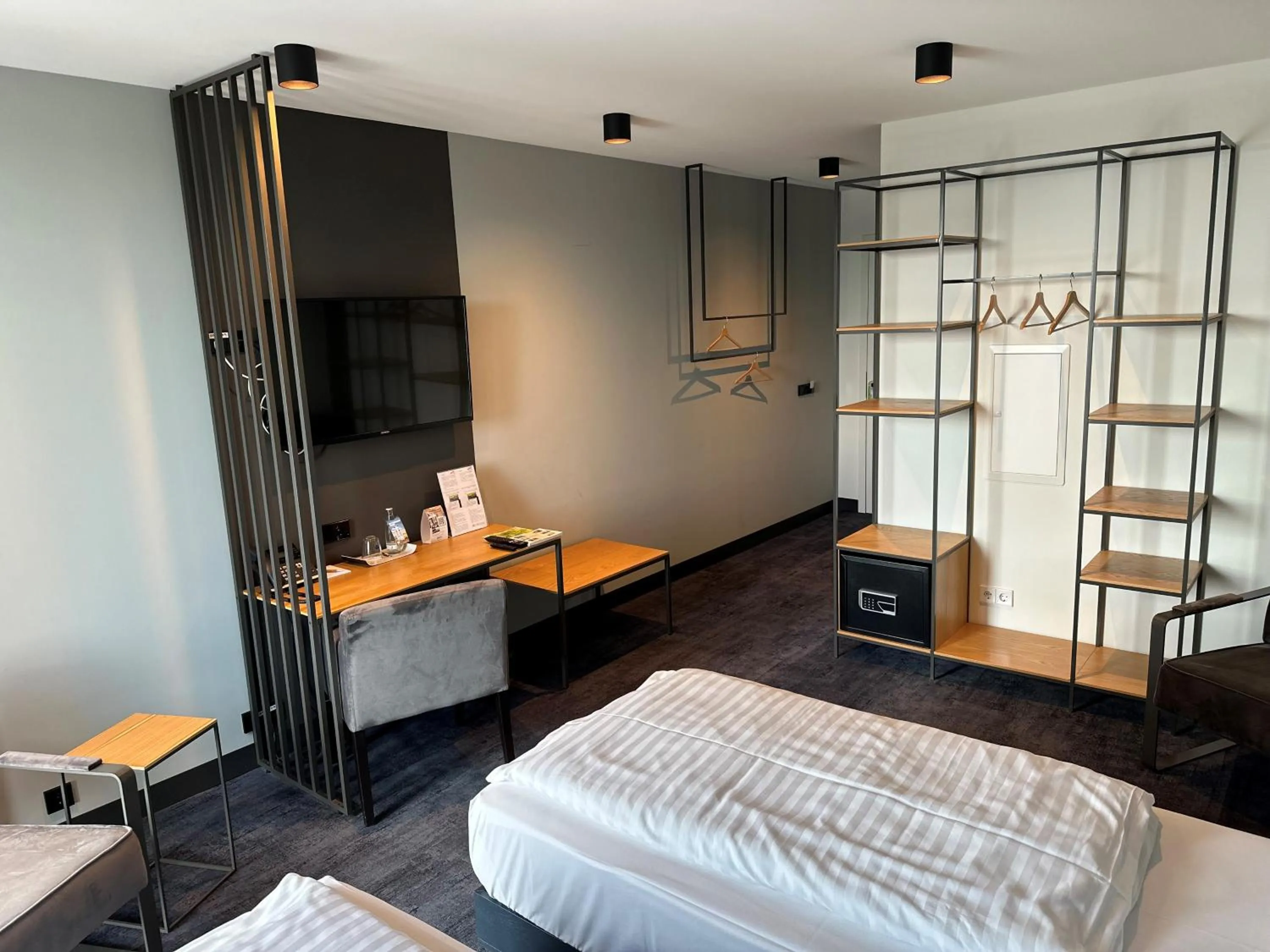 Bed in AKZENT Hotel DÉJANIL