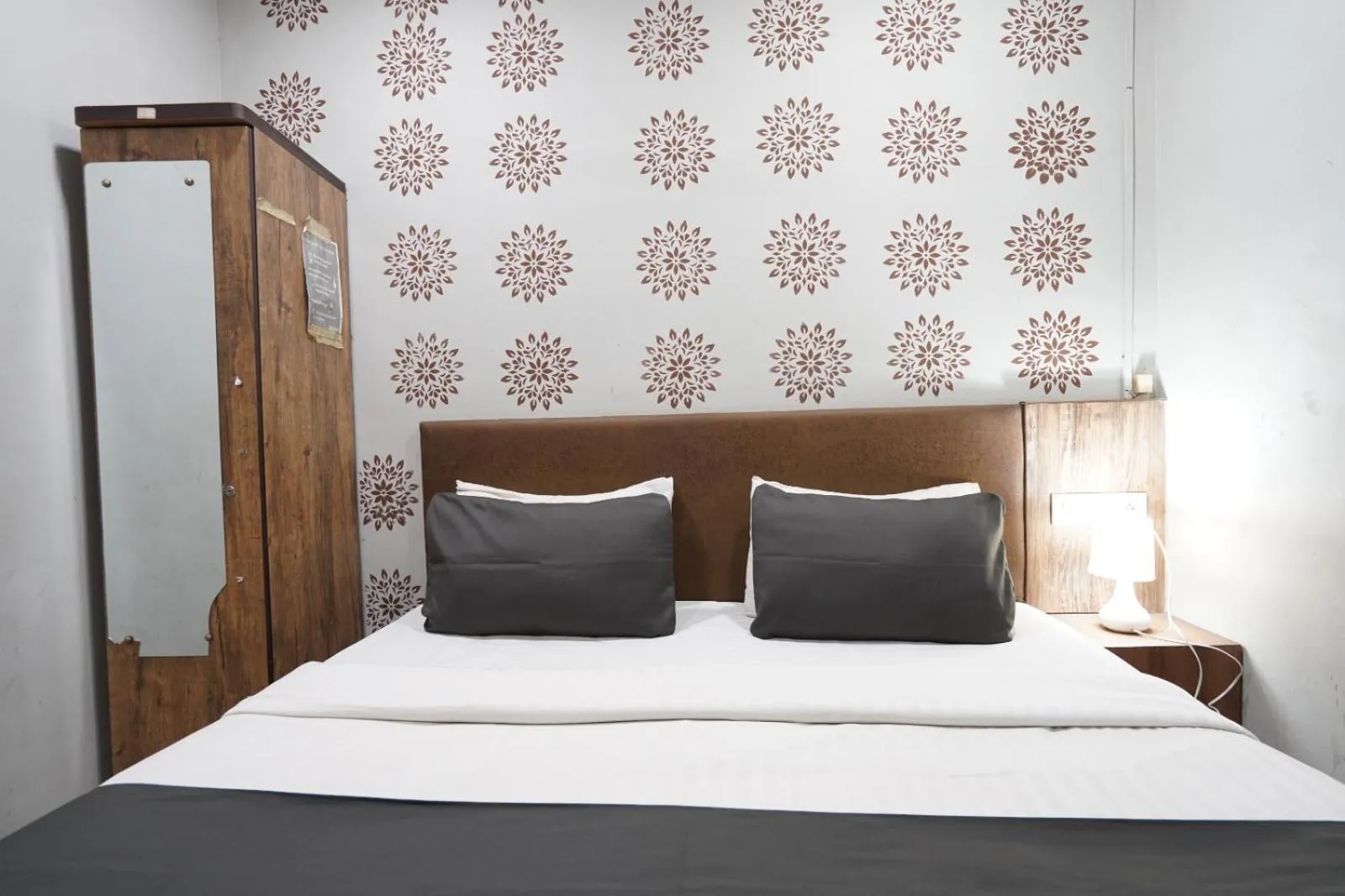 Photo of the whole room, Bed in Hotel Sai Inn, Ahmedabad Airport