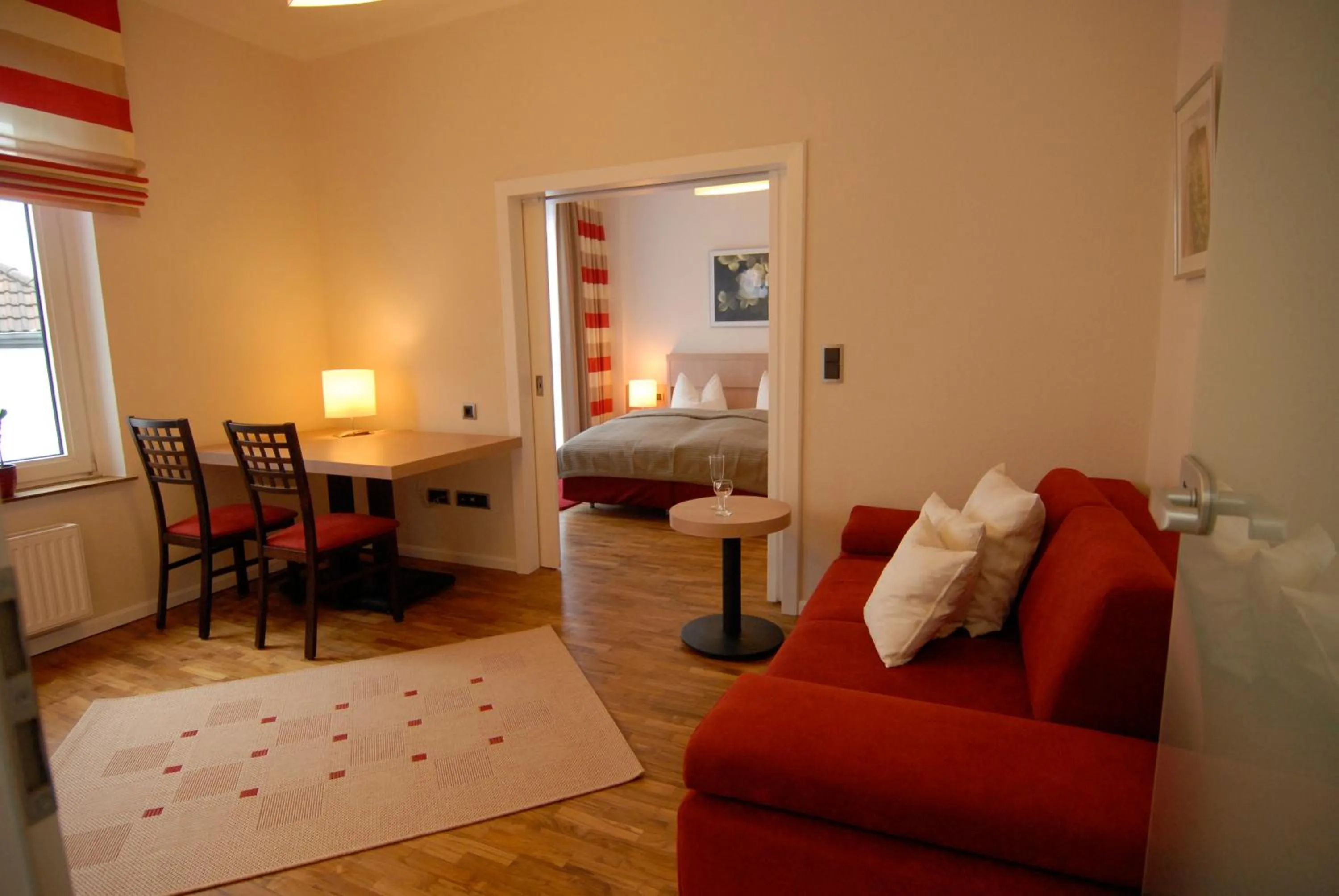 Seating area, Bed in Hotel Sprenz