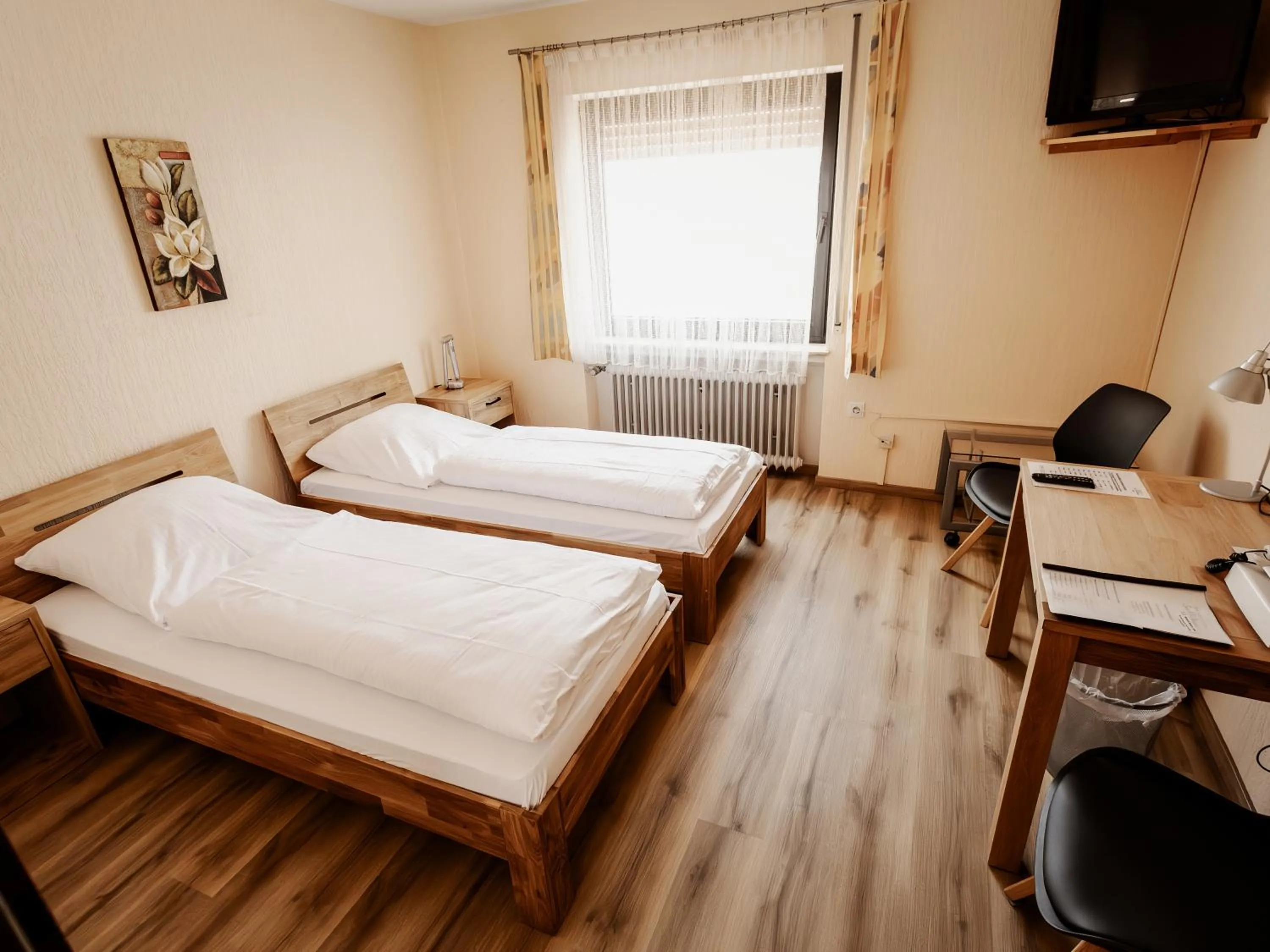 Bed in Hotel-Restaurant Zum Schwalbennest