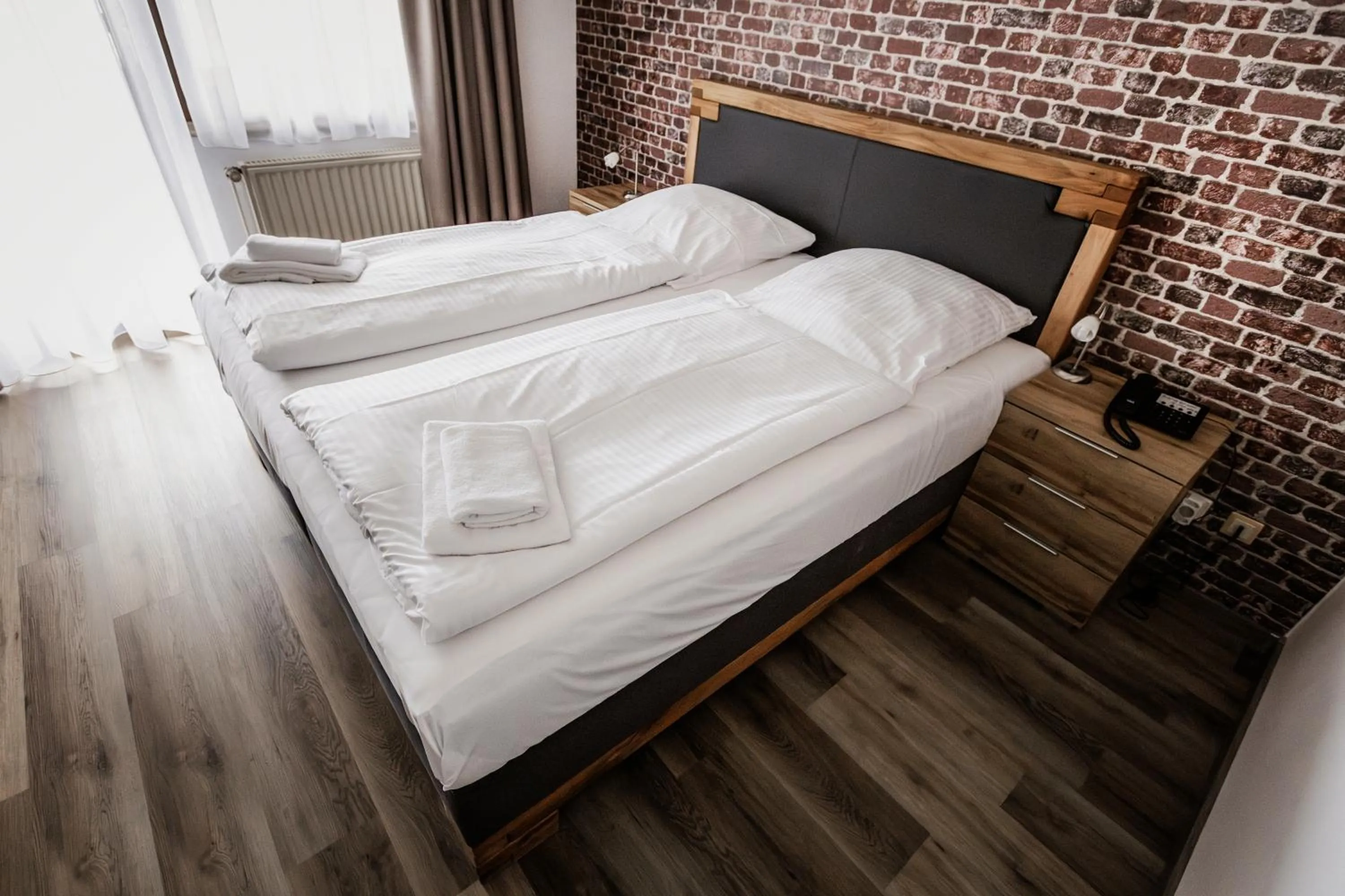 Bed in Hotel-Restaurant Zum Schwalbennest