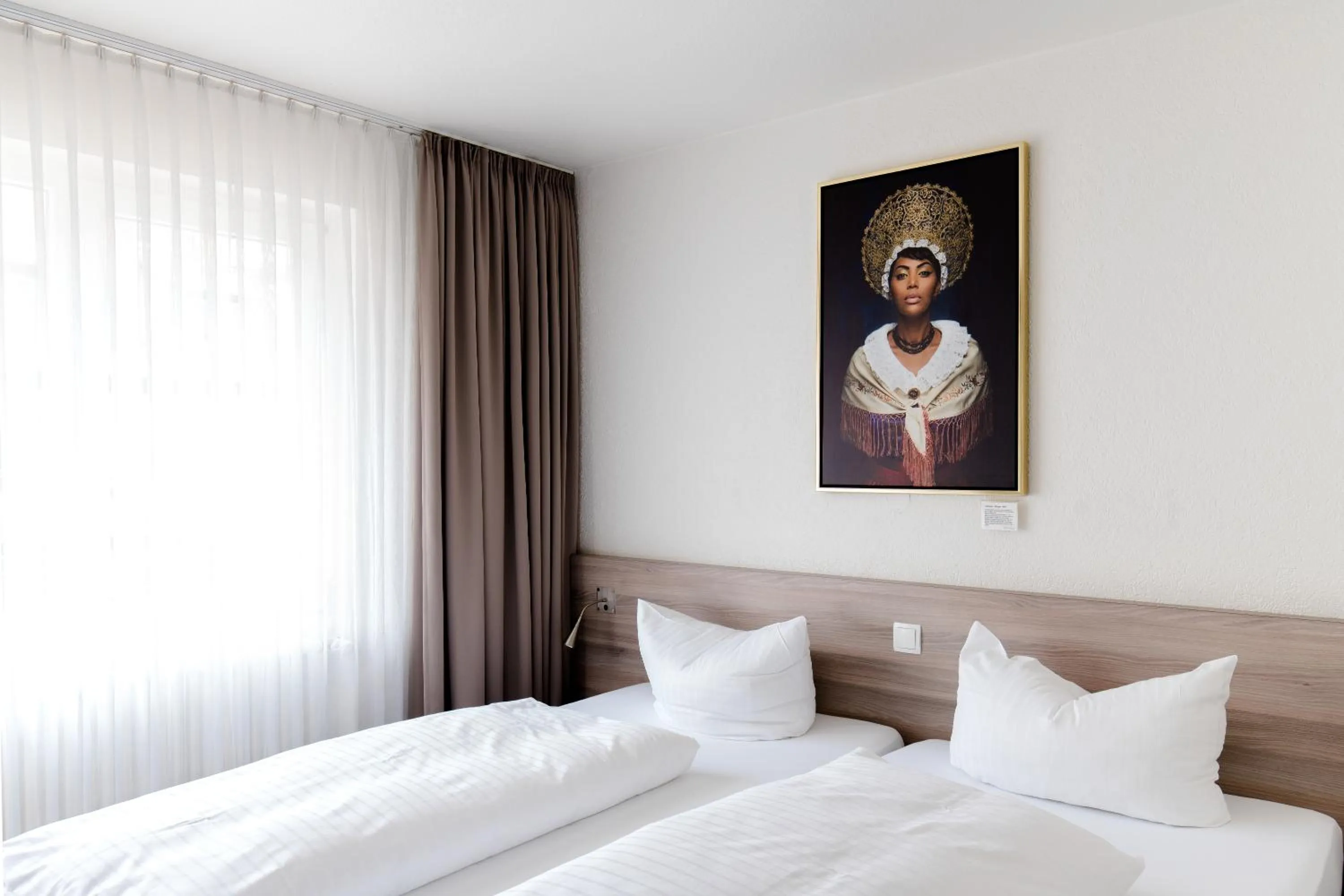 Bed in Hotel Schwarzwälder Hof