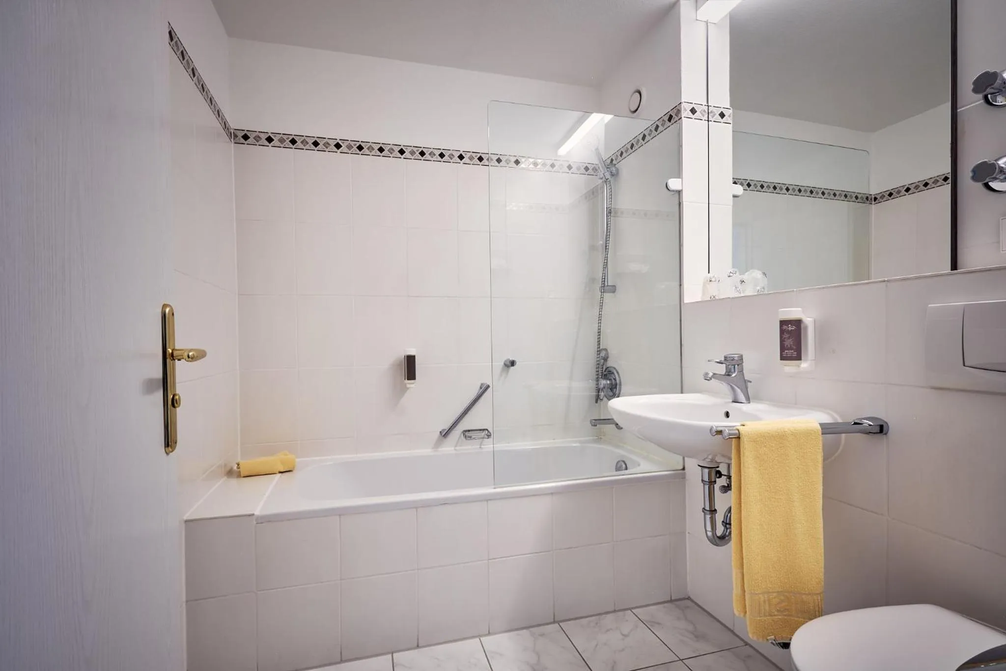 Bathroom in MY Parkhotel by AR Hotels