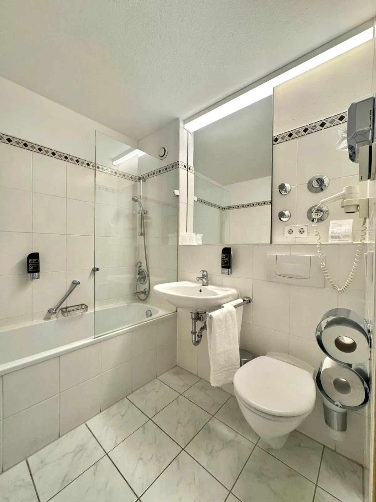 Shower in MY Parkhotel by AR Hotels