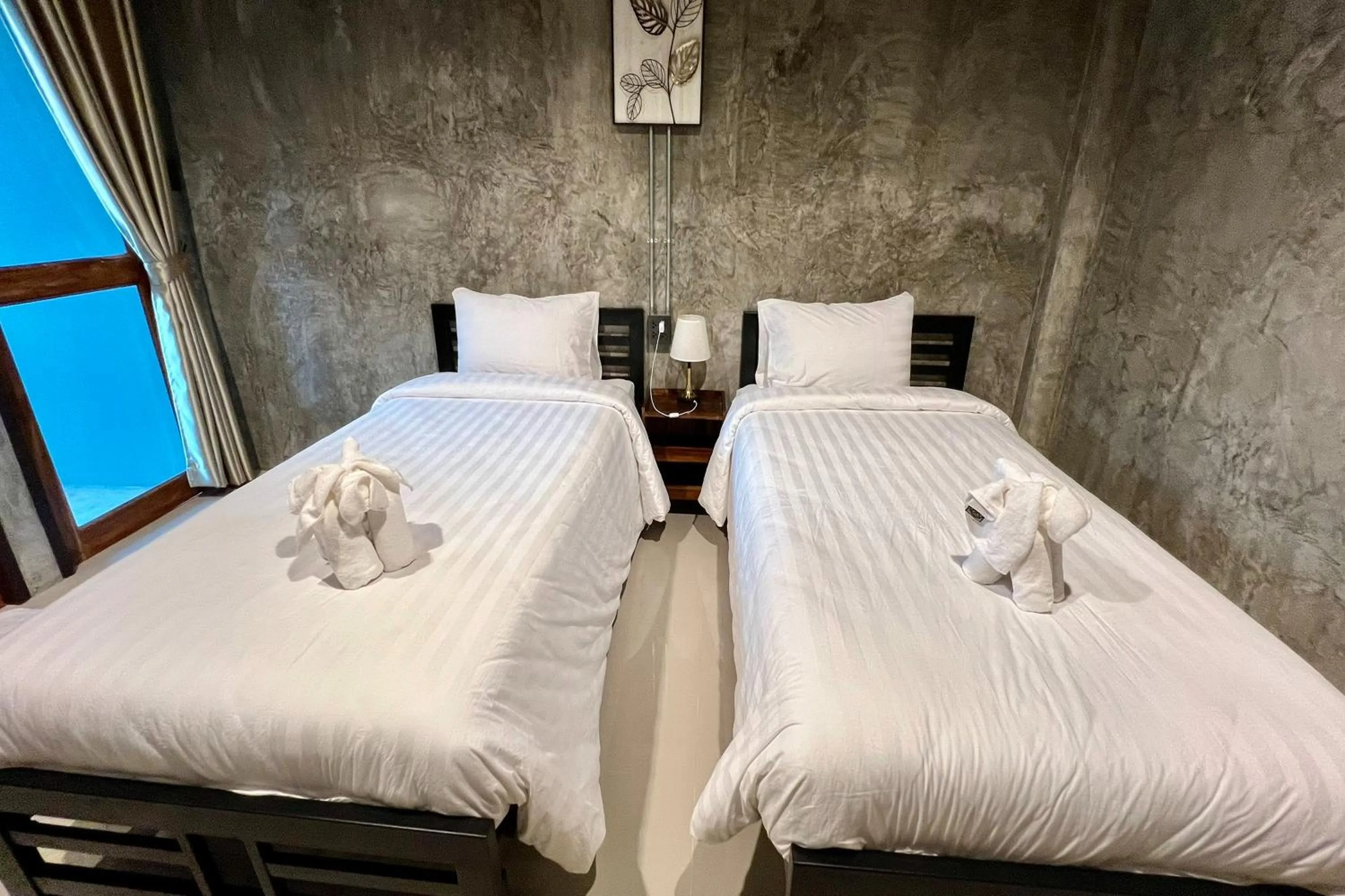 Bed in Nan Arena Place