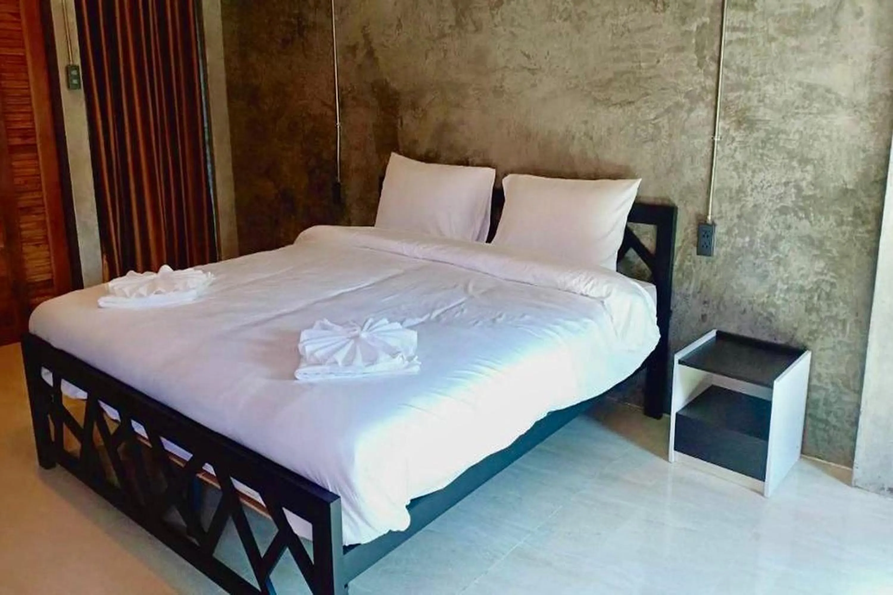 Bed in Nan Arena Place