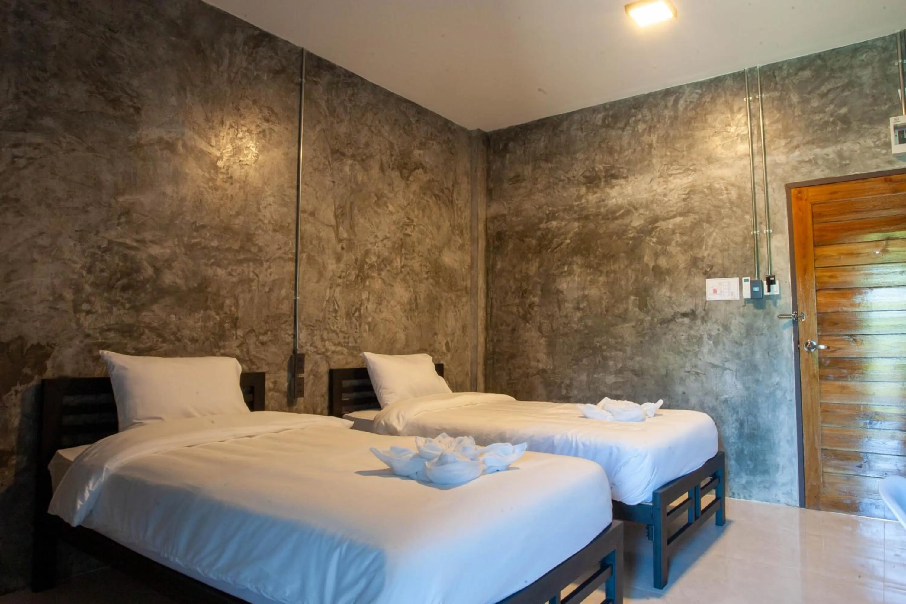 Bed in Nan Arena Place