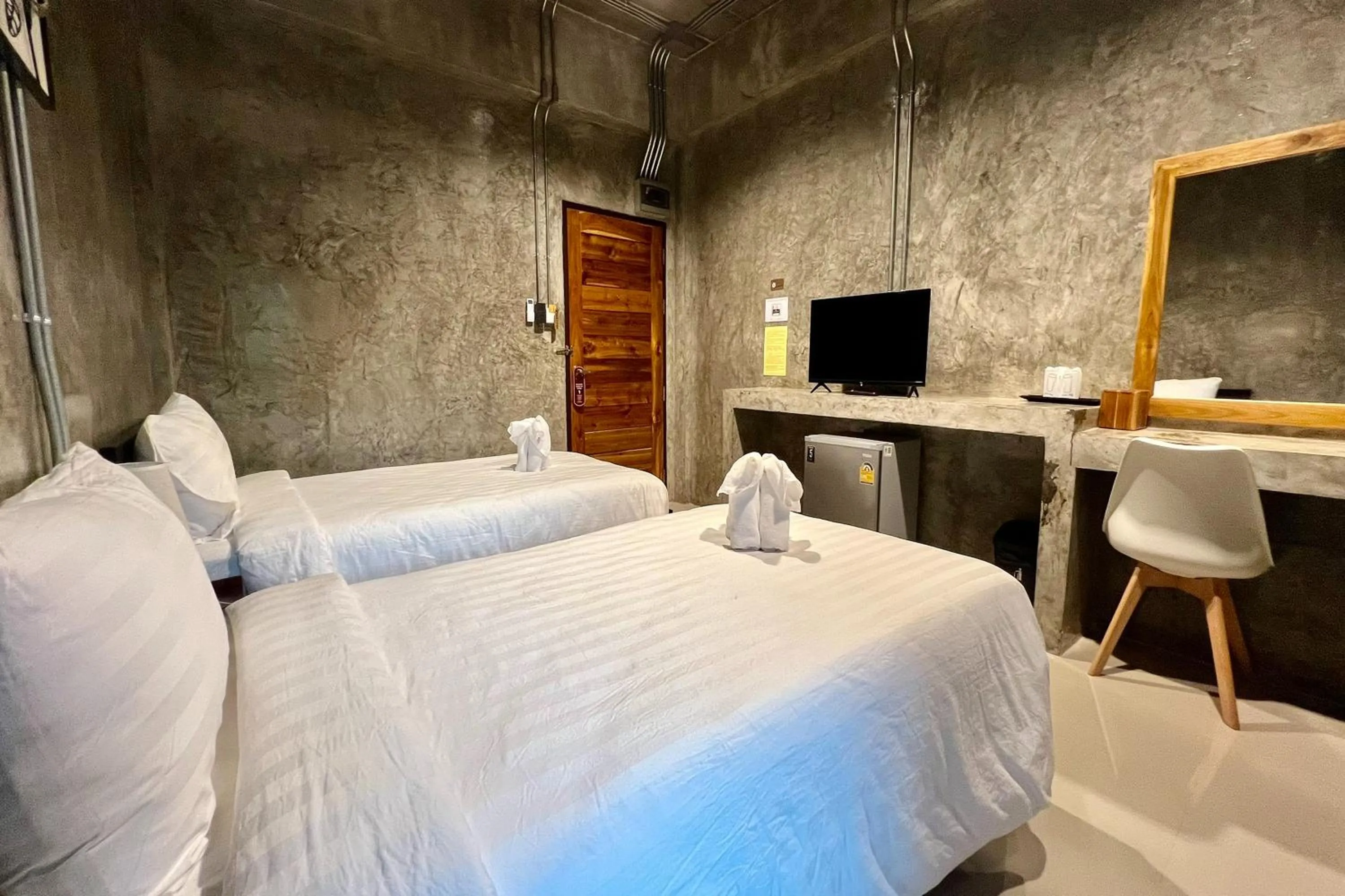 Bed in Nan Arena Place