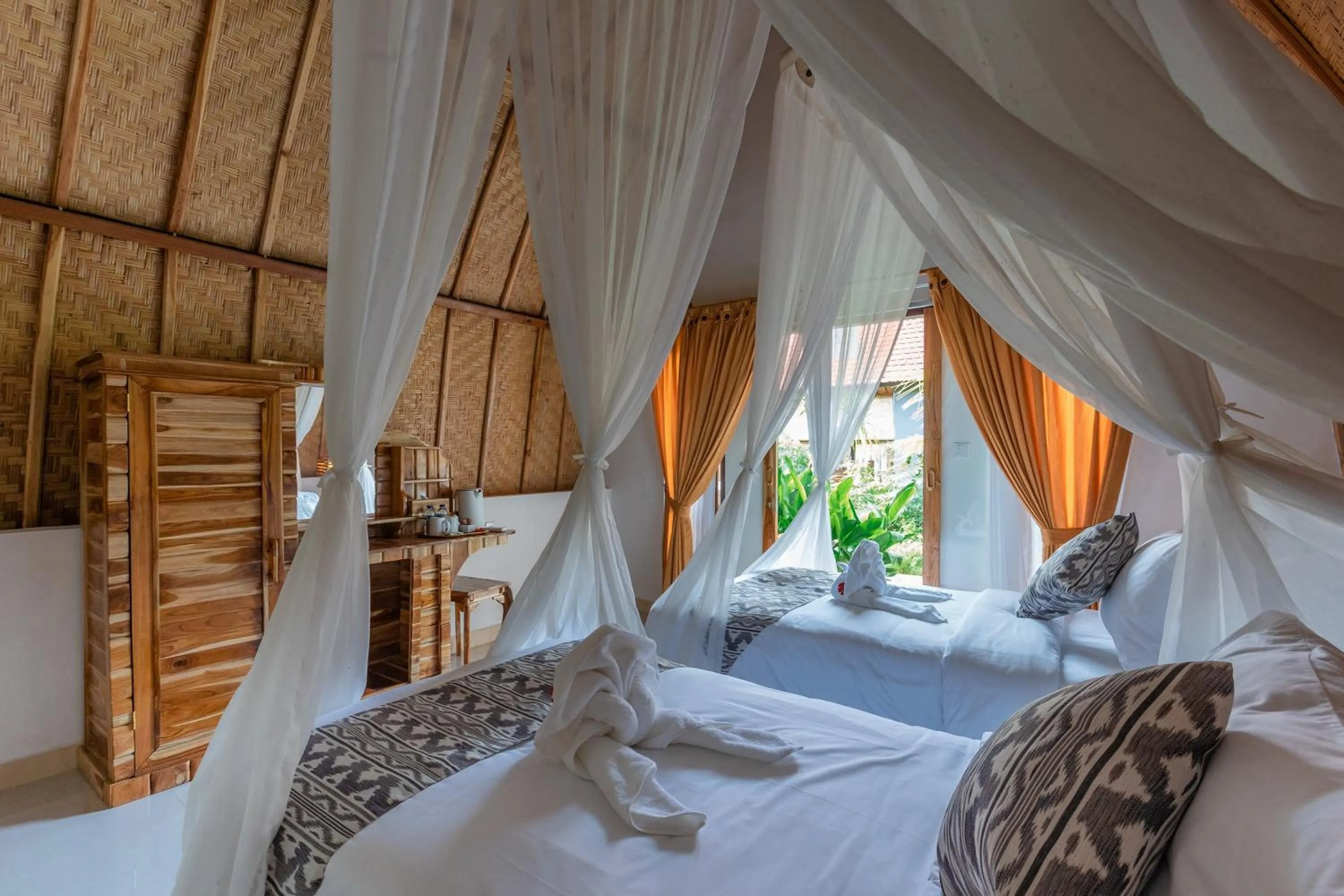 Bed in Penida Sunset Ocean View Bungalows