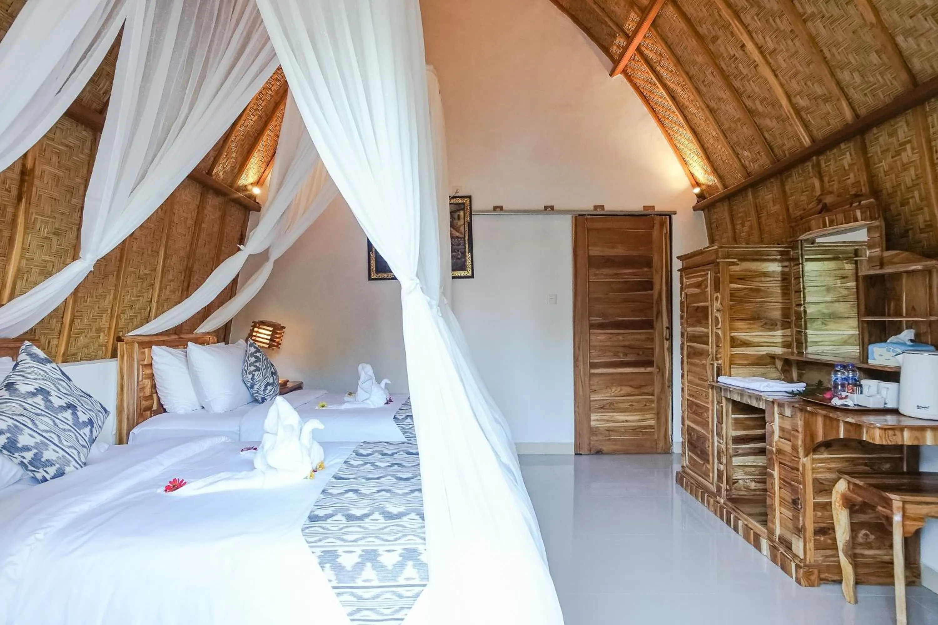 Bed in Penida Sunset Ocean View Bungalows