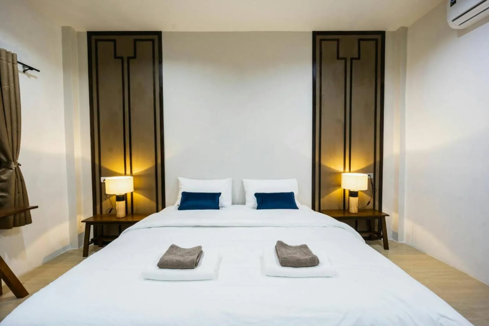 Bed in Nararin Garden House