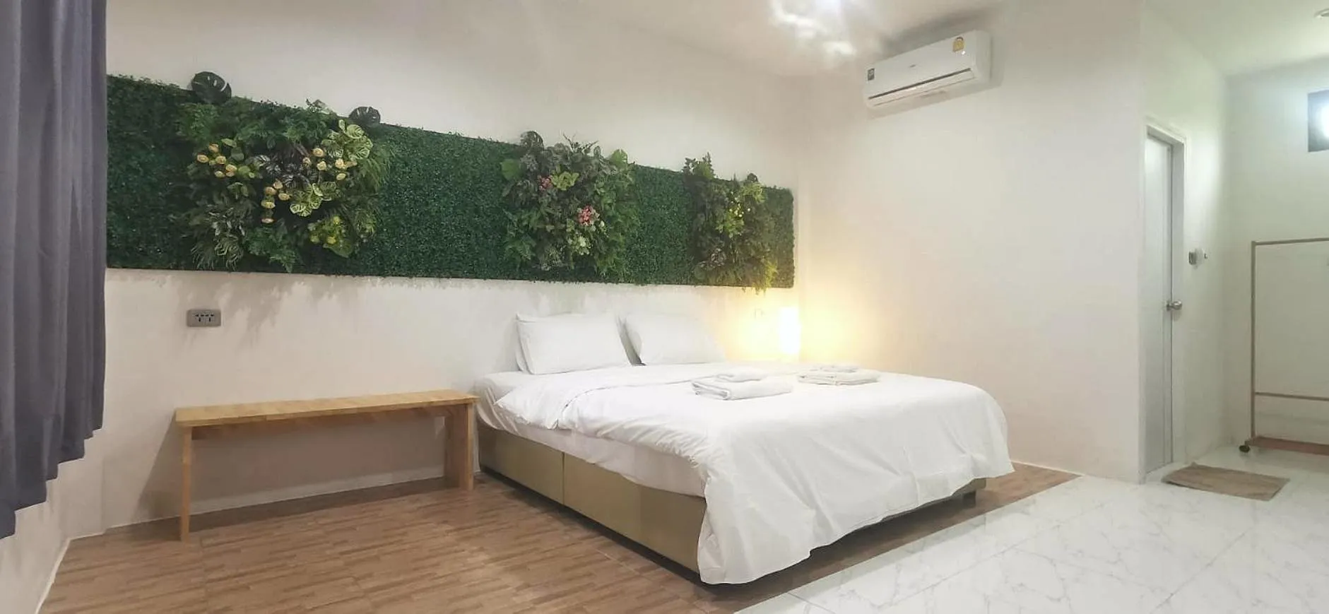 Bed in Nararin Garden House