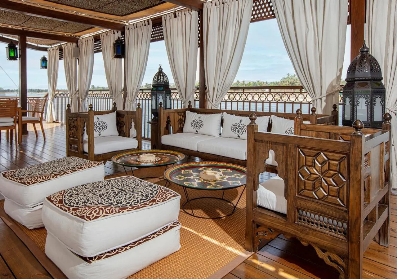 Seating area, Bed in Dahabeya Yakouta Nile Cruise-Every Monday from Luxor- Aswan for 05 nights