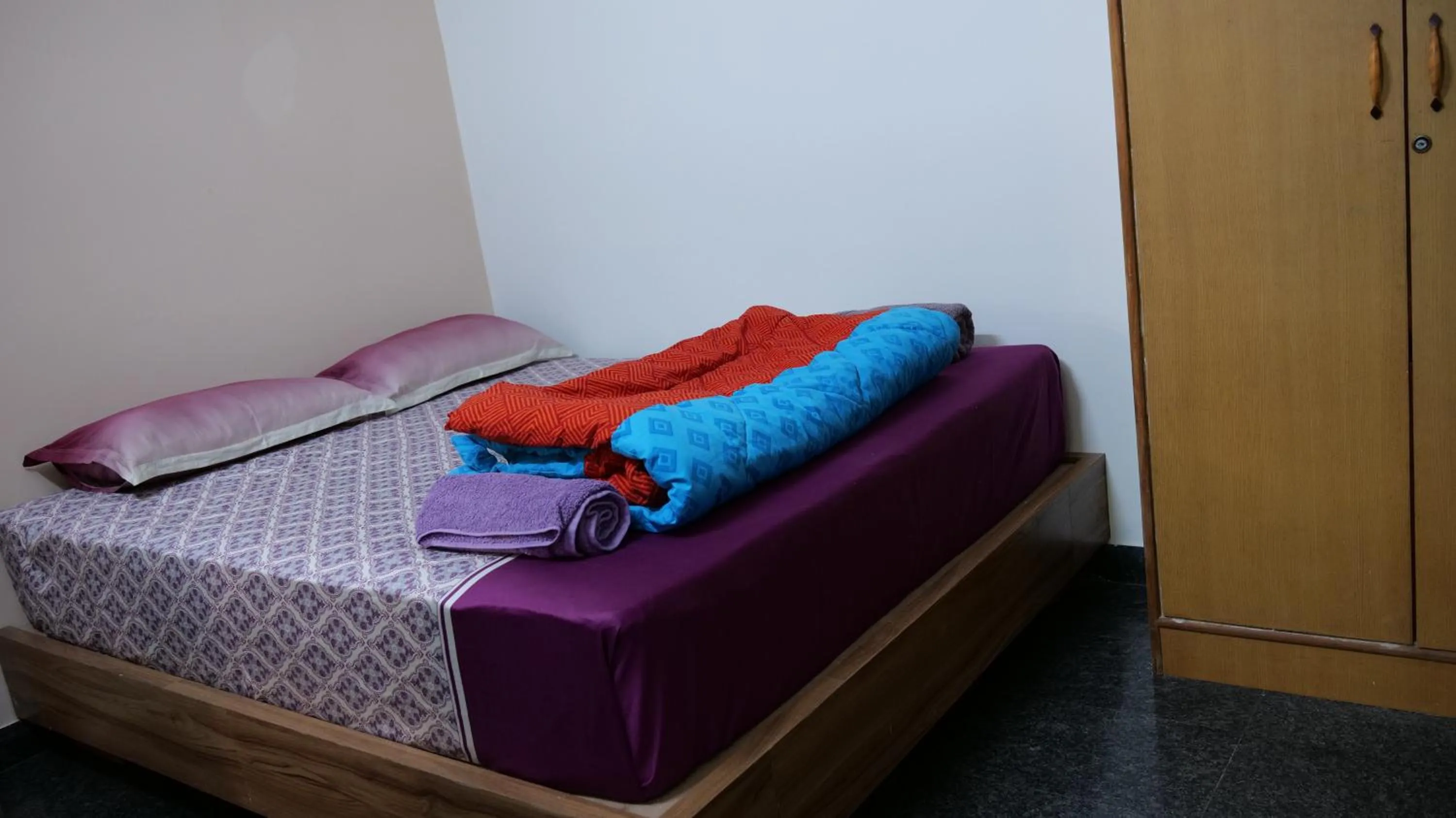 Bed in The Ventura Grand Hotel