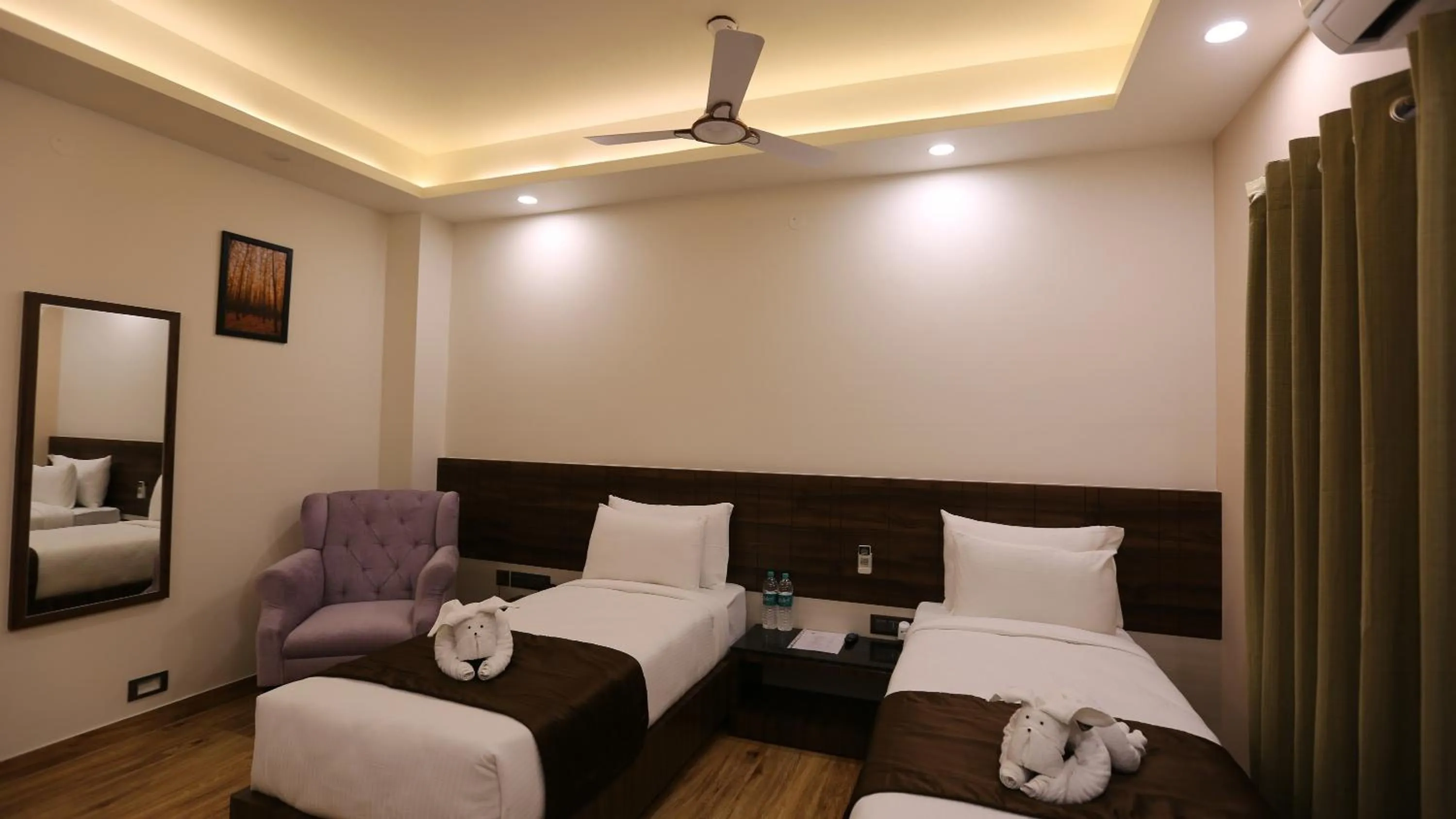 Bed in The Ventura Grand Hotel