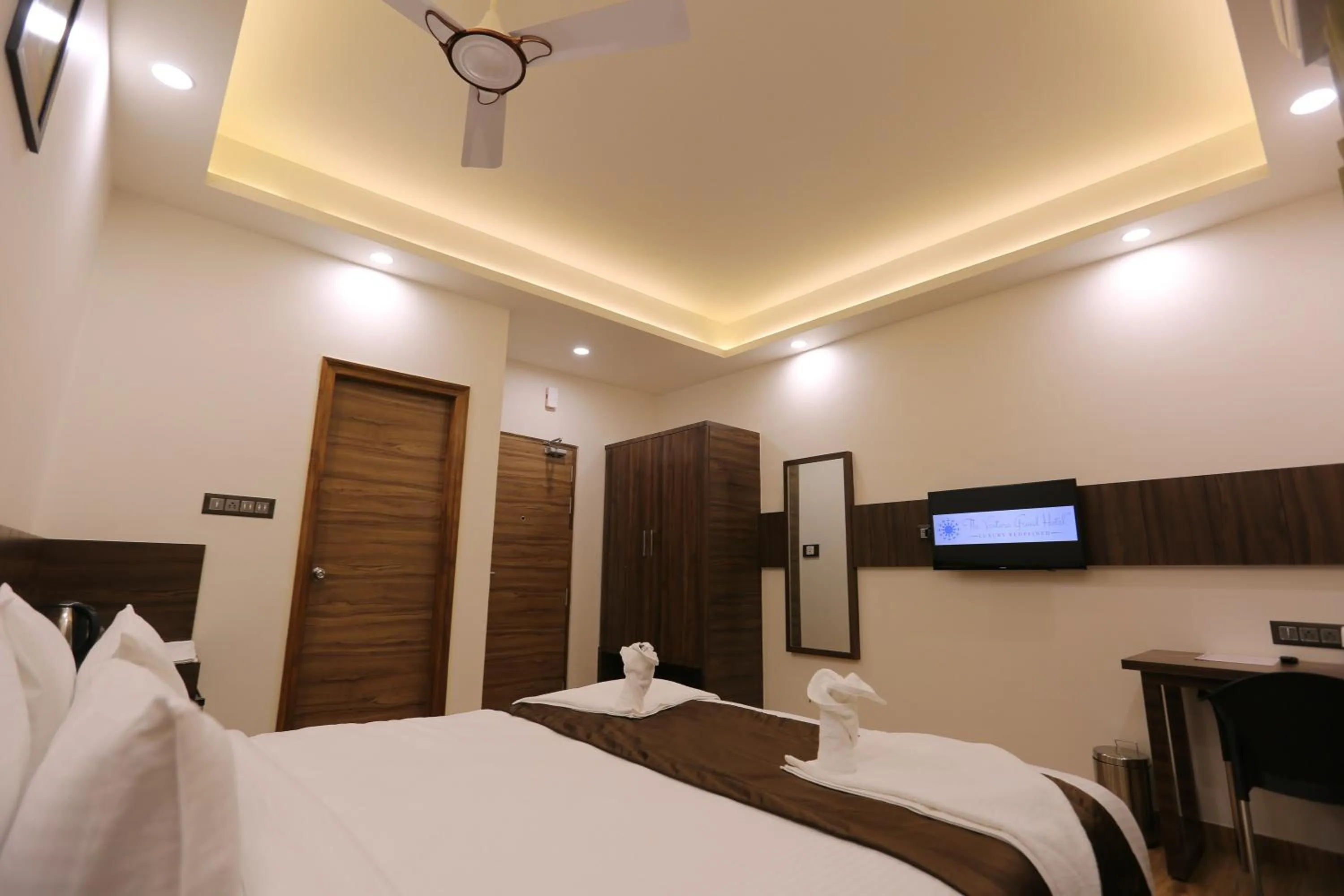 Bed in The Ventura Grand Hotel