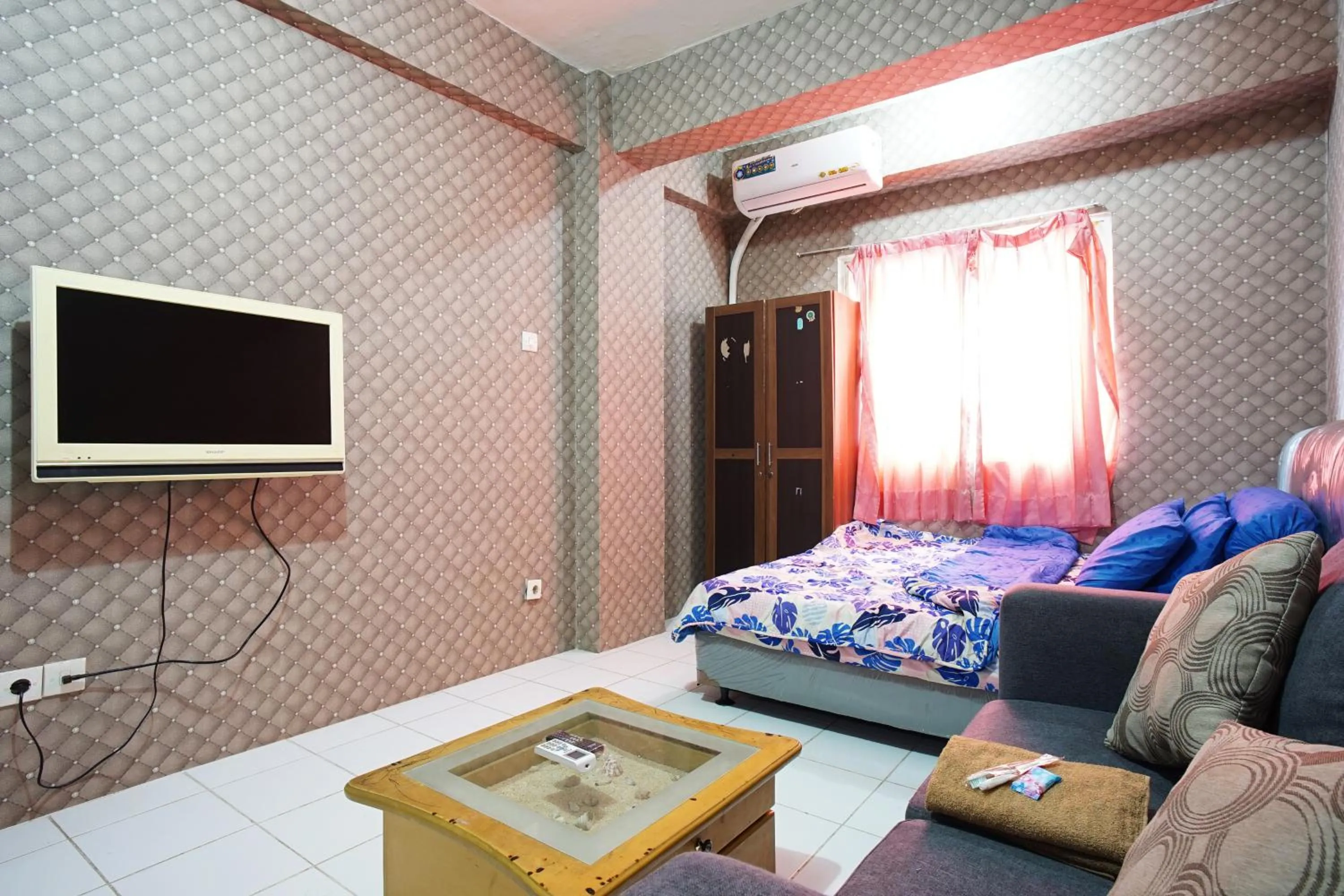 Bed in City Park Apartment by Anita