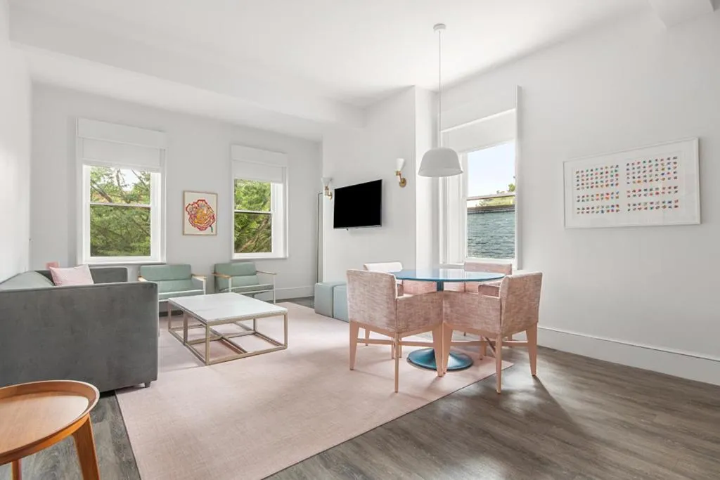 Communal lounge/ TV room in The Doyle Hotel