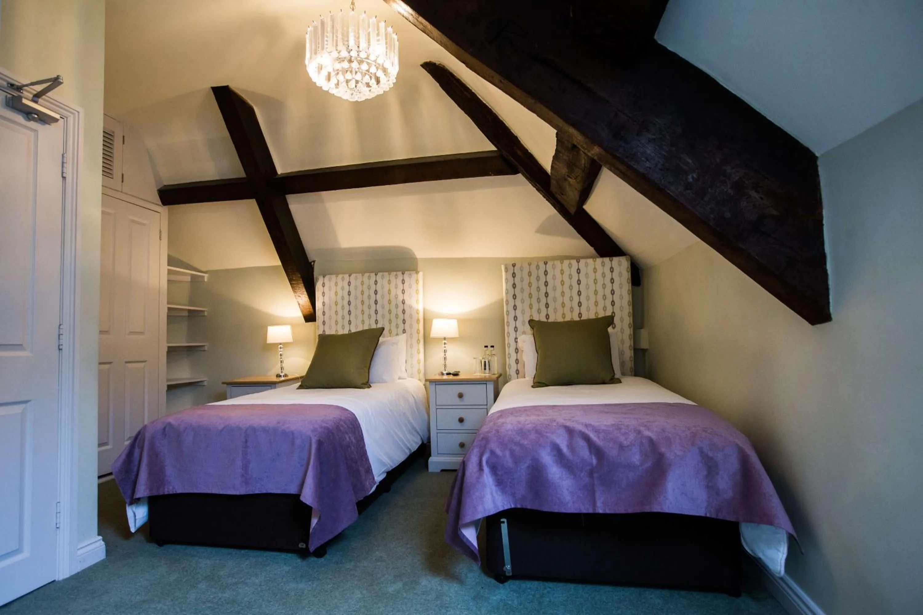 Bed in The Wyndham Hotel