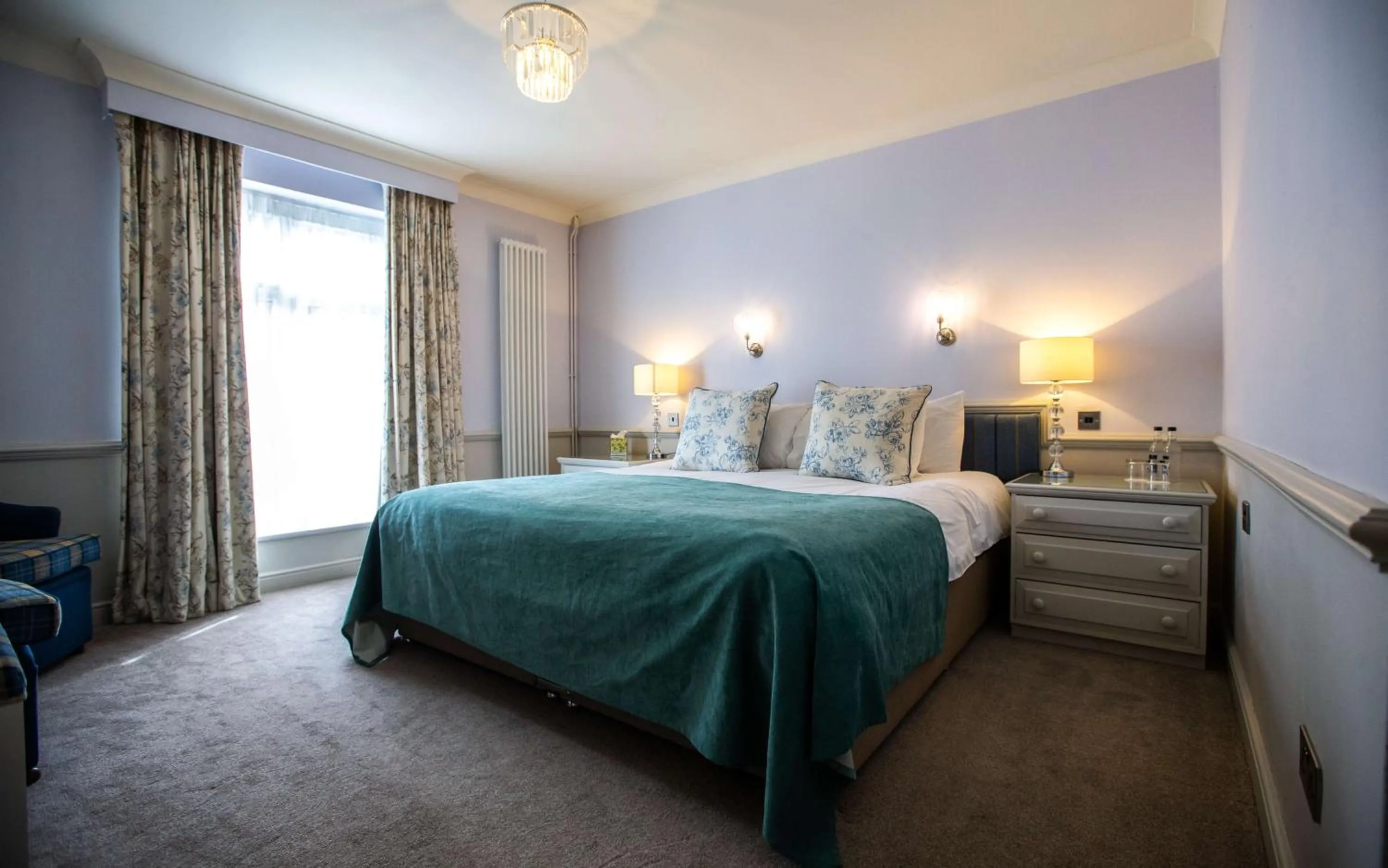 Bed in The Wyndham Hotel